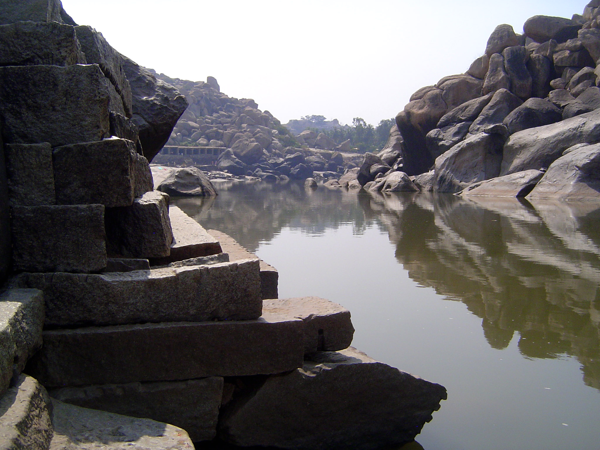 Where did the road go? Try a bridge. In the background is the Chakratirtha, a place of pilgrimage.