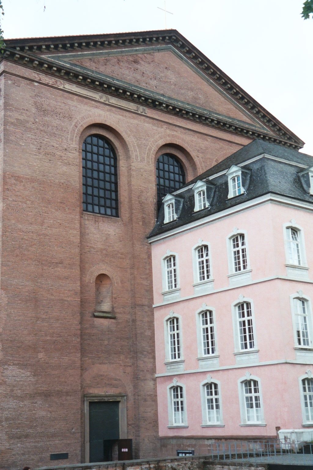 The entrance to the basilica is now through the understated door on the left.