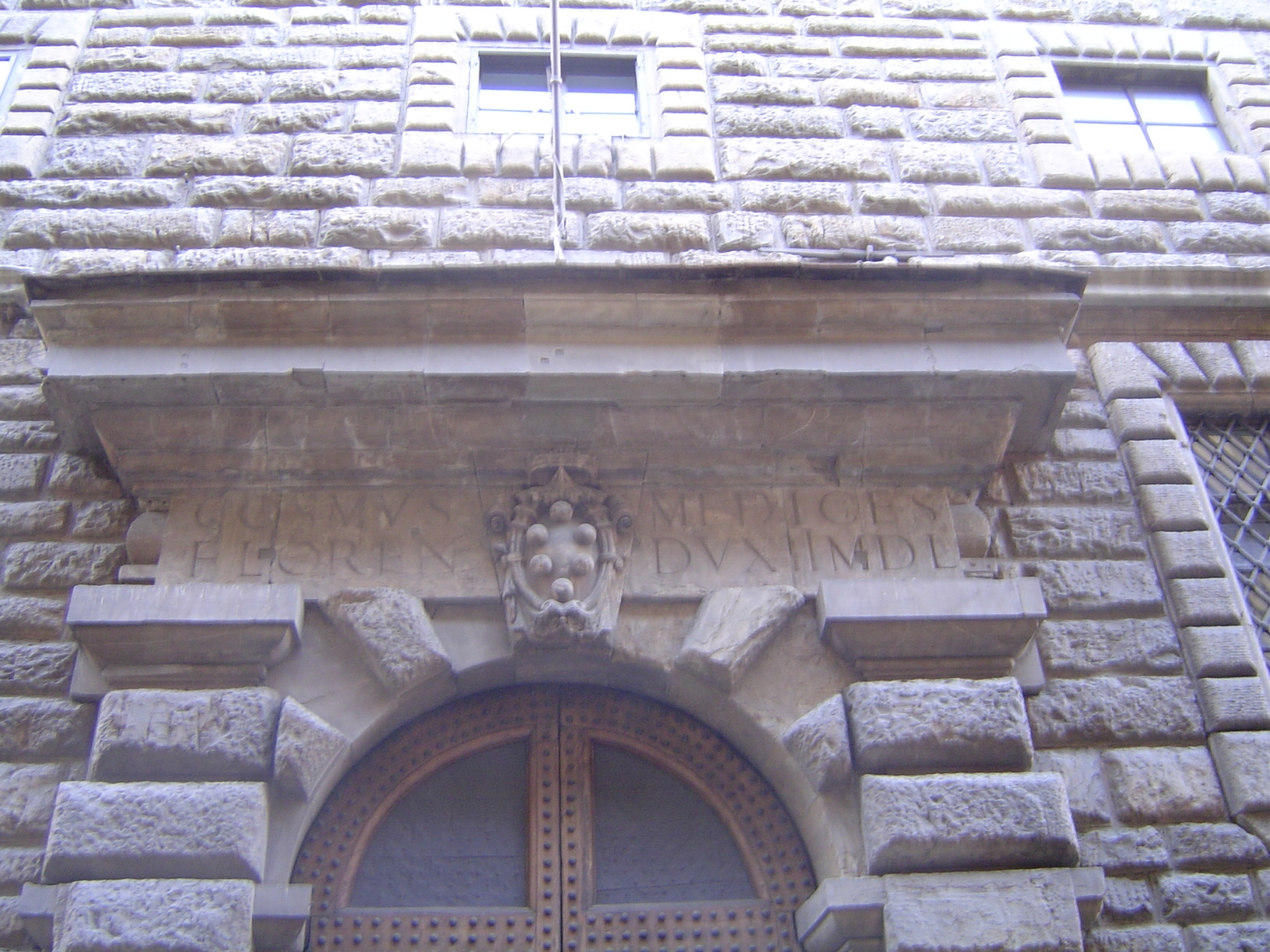 This could almost be part of a public building in any American downtown, but it's the back side of the Palazzo Vecchio, and the inscription