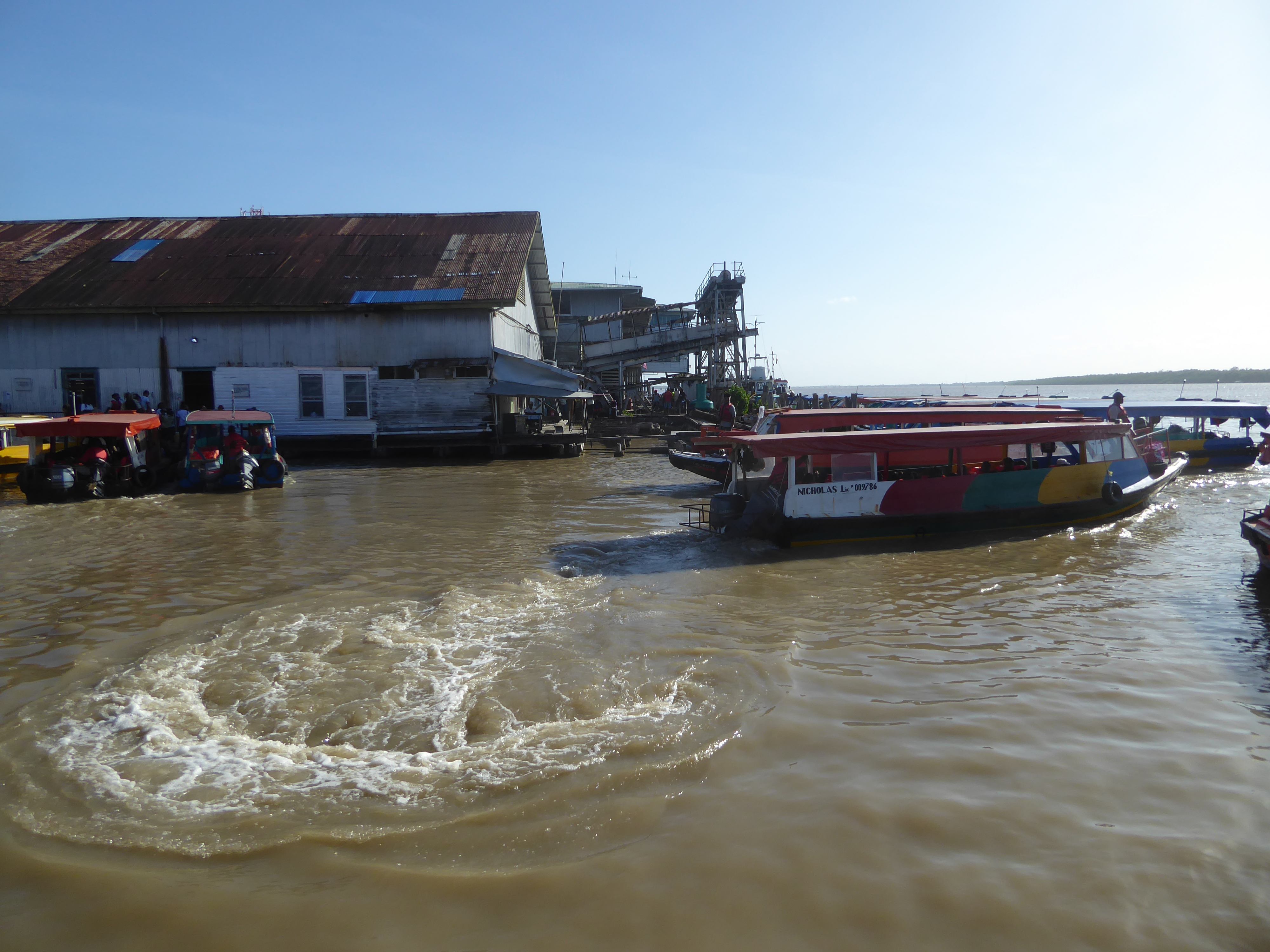 For foot-passengers, small ferries are much quicker than going upstream to the bridge, not even visible here.