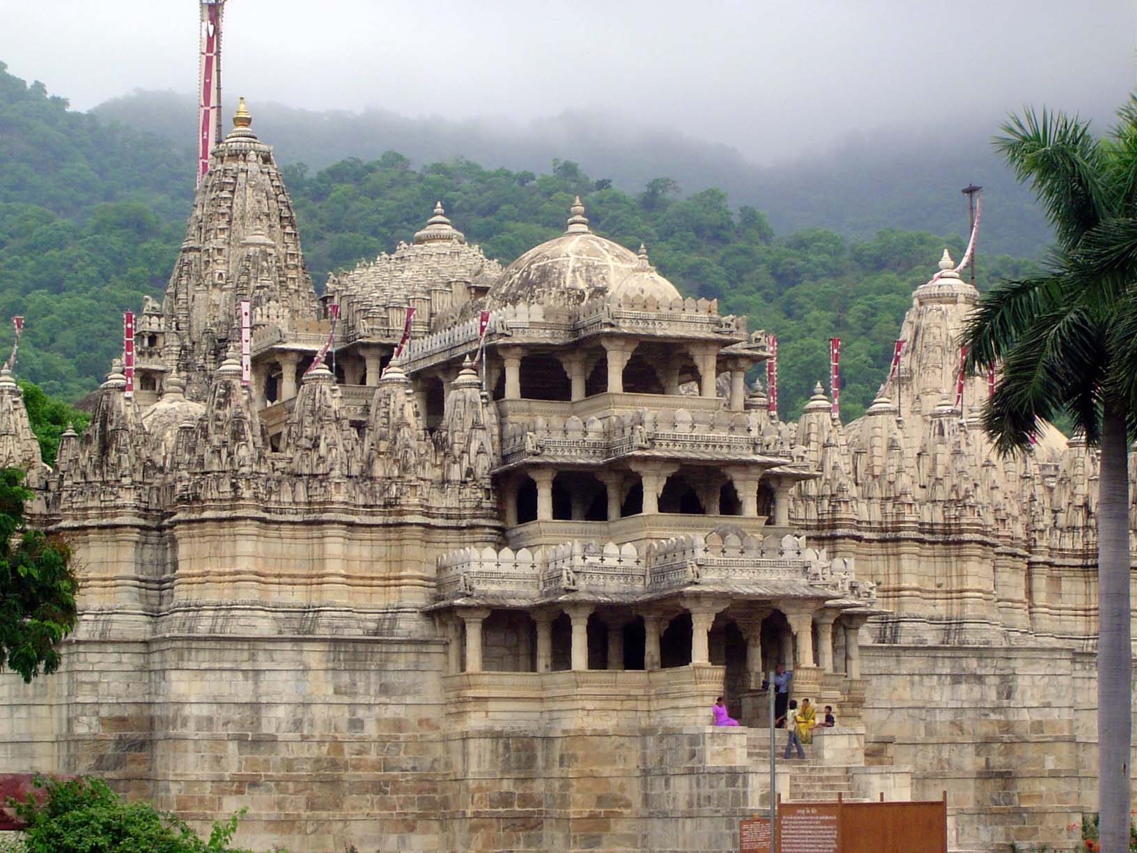 Like most Jain temples, the exterior wall is severe, only the roof hinting at the exuberance of the interior. The floor plan is a square 200