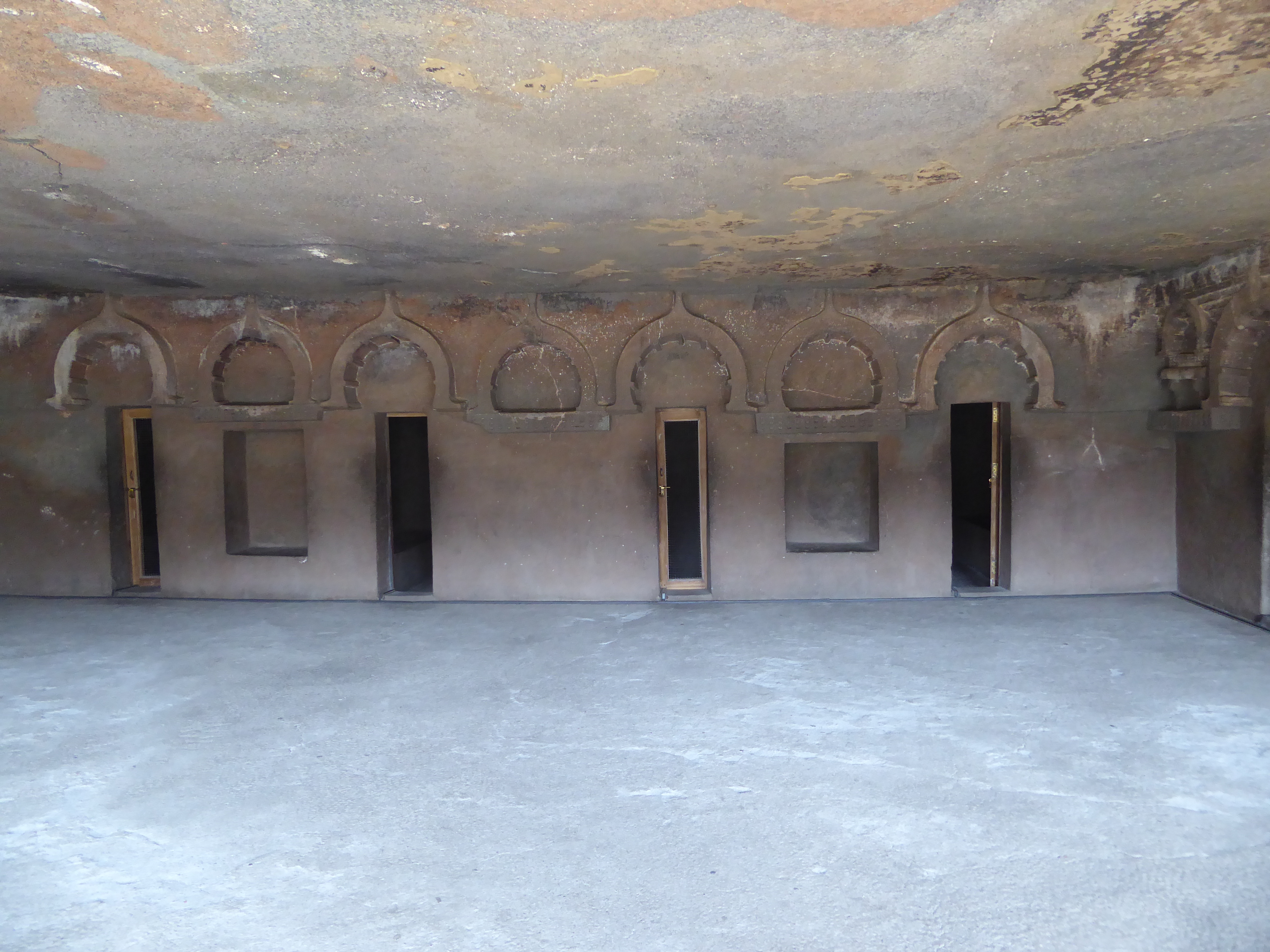 Here's the inside. It has twelve cells, each with two benches serving as beds. In other words, there's accommodation for 24 monks. Not much