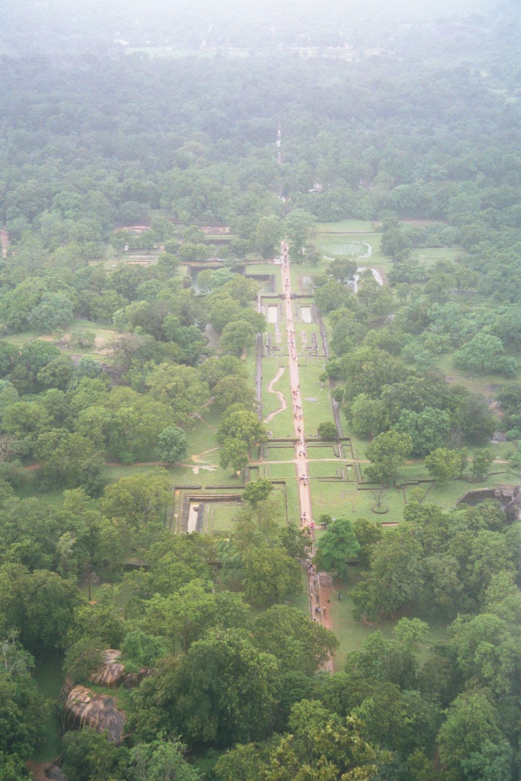 A view down to the palace—and the same approach walk seen earlier from below.