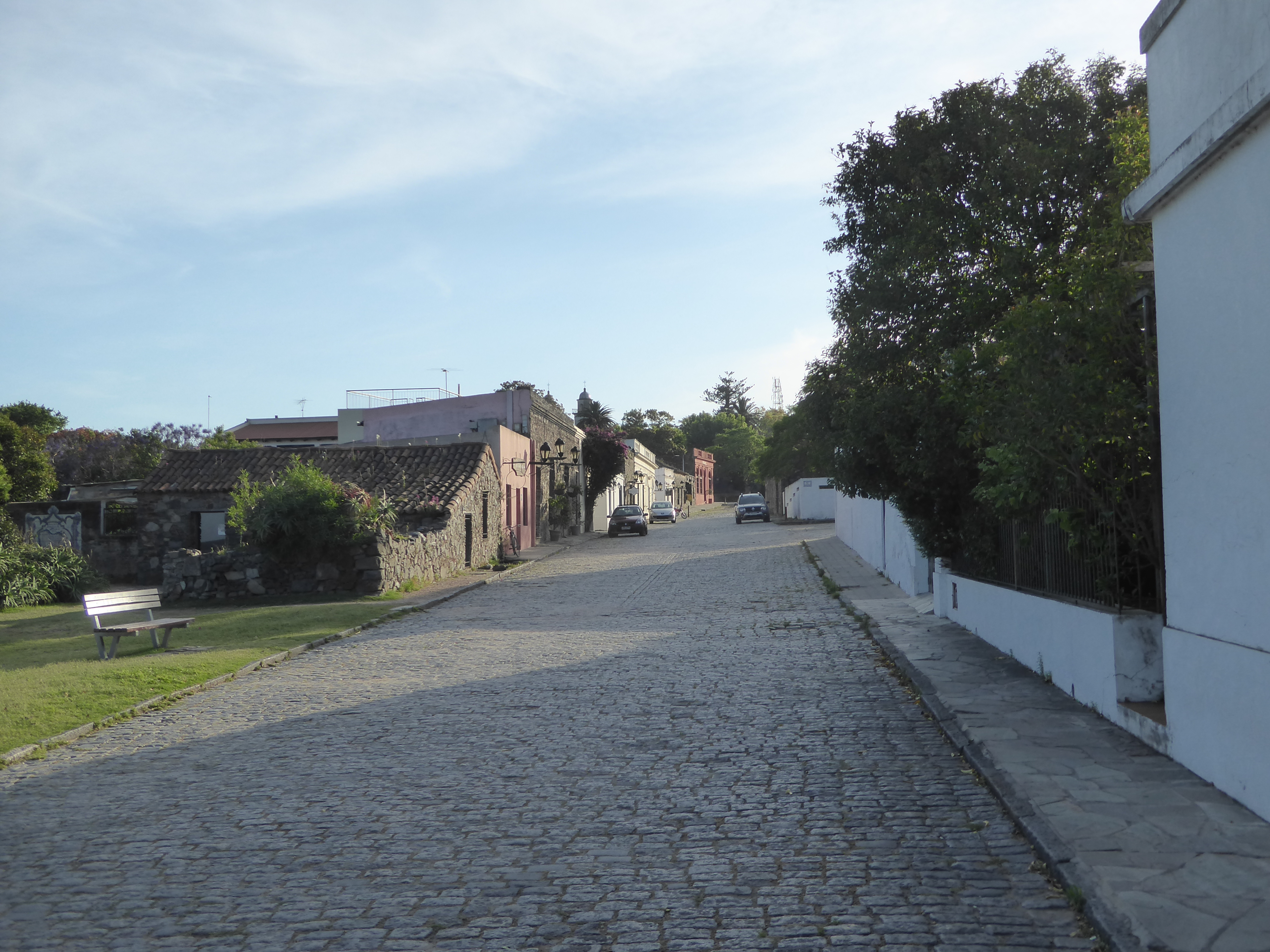 A Portuguese street, probably repaved at some point but still ignoring the cardinal rectitude of Spanish towns. The Portuguese part of Colon