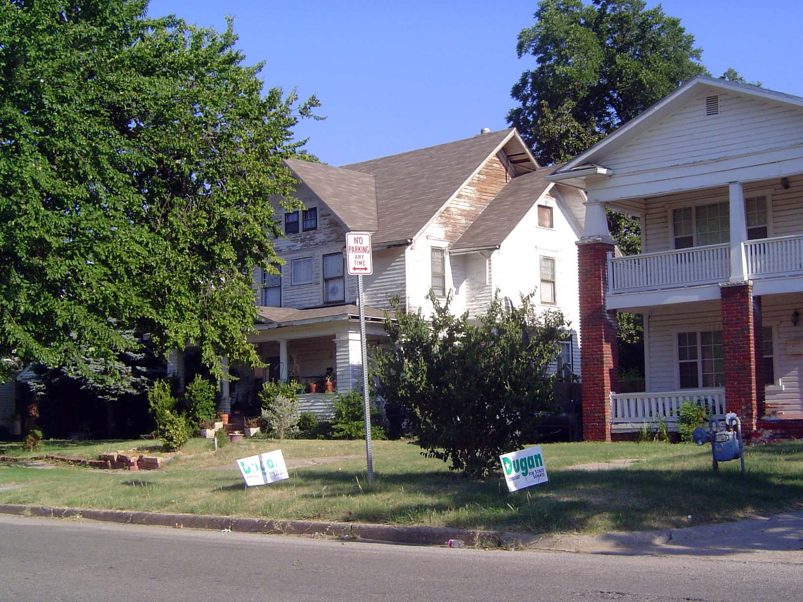 These houses are across the street from the south side of the college grounds. The house on the left, built in 1910 at 1316 NW 17th, was sol
