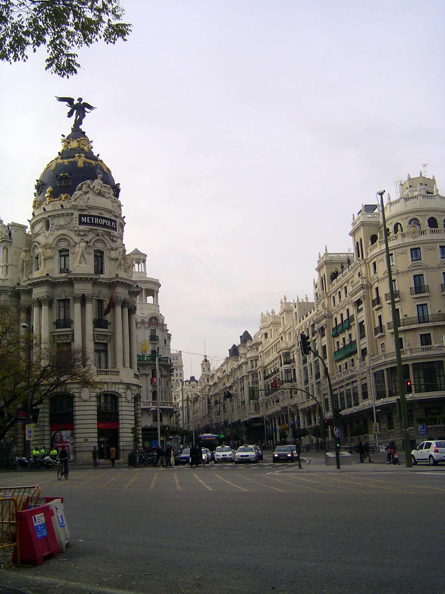 The Gran Via begins here at the intersection with the much older Calle de Alcala. The Beaux-Arts Metropolis Building opened in 1911, while t