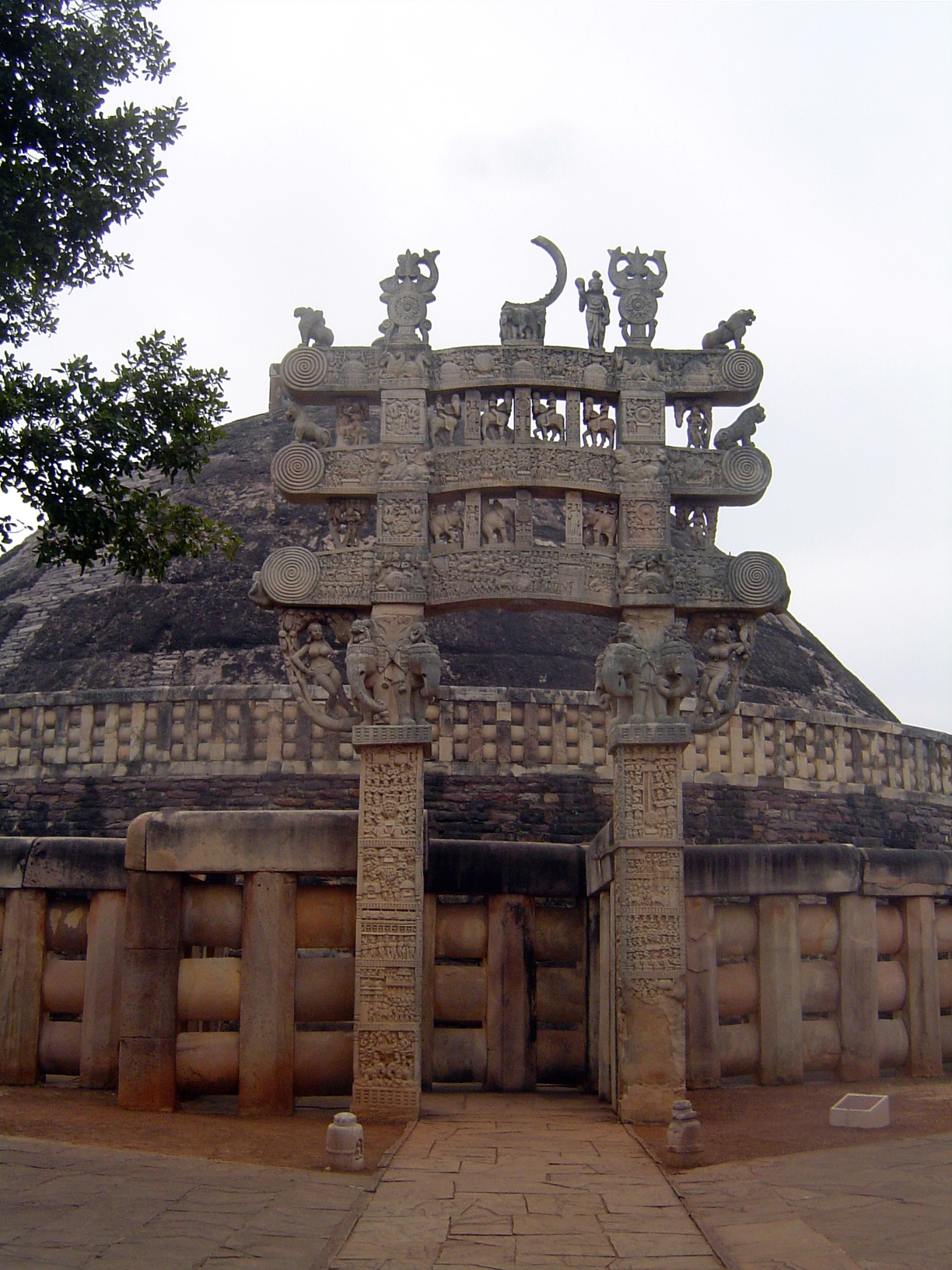 The glories of the stupa are its four toranas or gateways. These were added late in the first century B.C., when Sanchi had fallen to the An