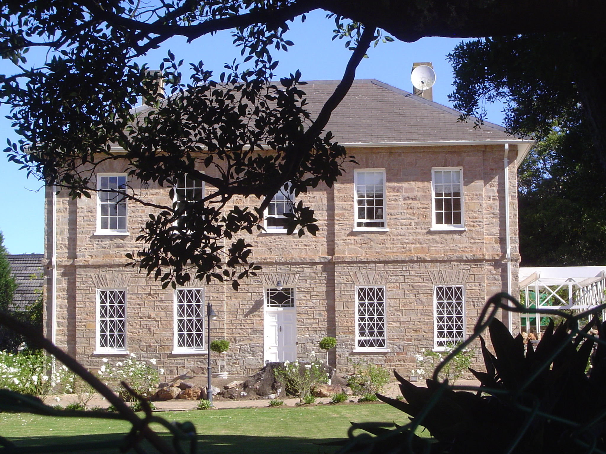A banker's house? This is Crossways, built before 1858 to a design by an architect, John Wood. It is now the residence of the headmaster of