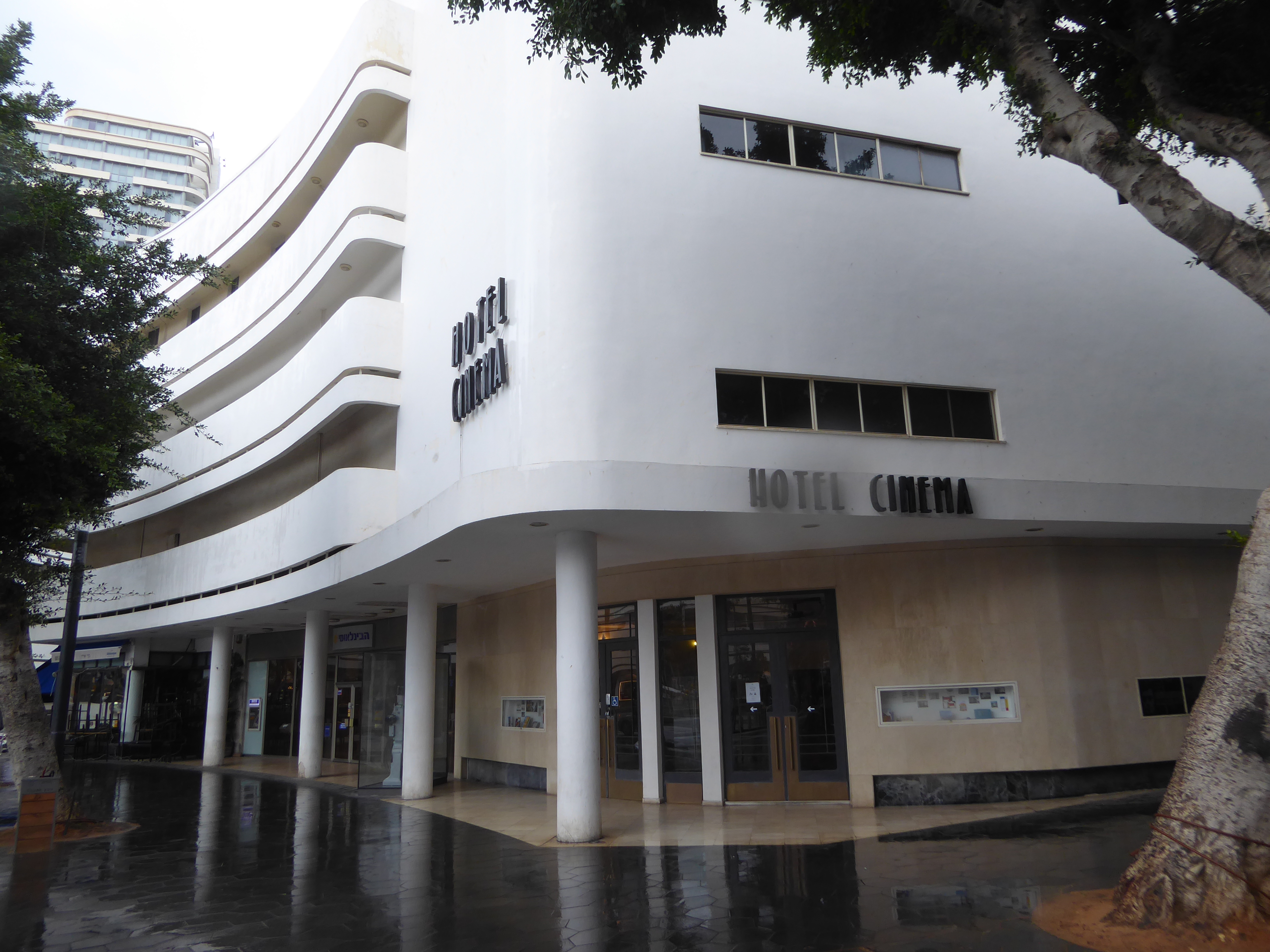 The buildings around the circular square include the former Esther Cinema, which opened in 1939 as an air-conditioned cinema showing Snow Wh