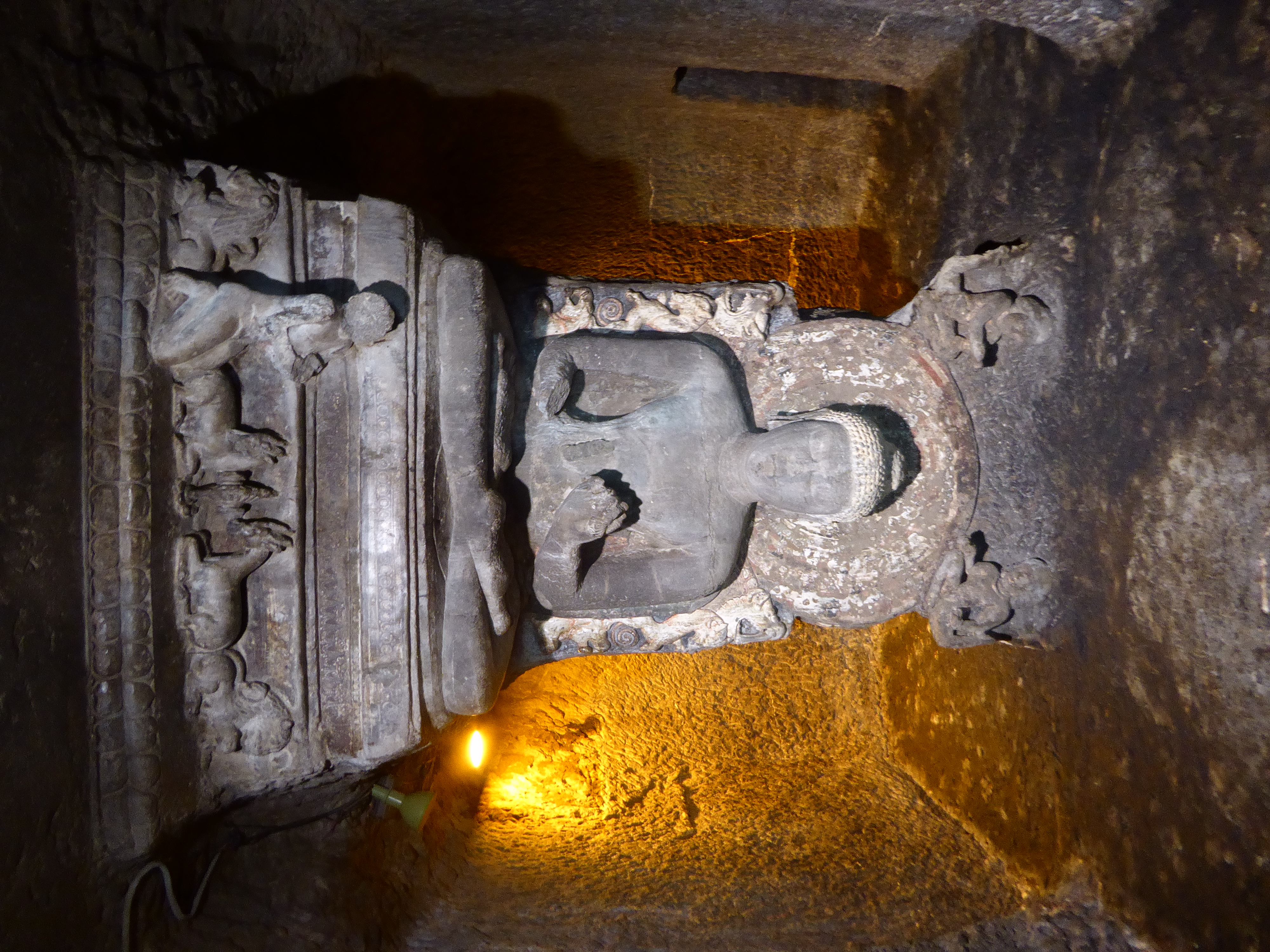 It also has a worshipper praying at the Buddha's feet.