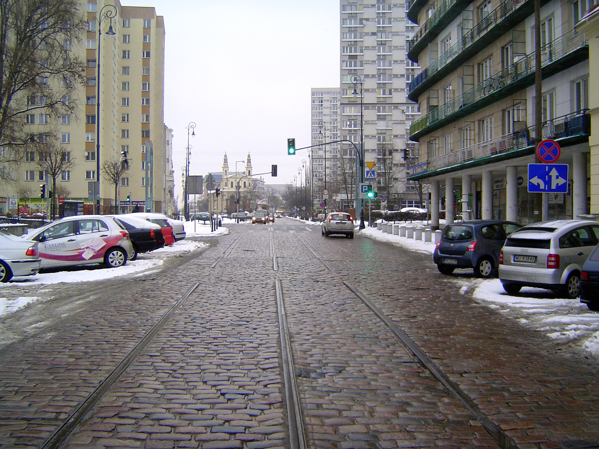 Chlodna Street, once a main street too important to be closed off even though it ran through the ghetto. A fenced bridge over the street at