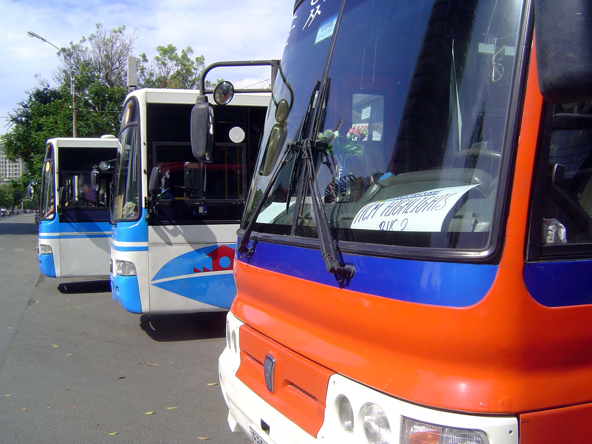 Tour buses making the HCMC Highlights circuit.