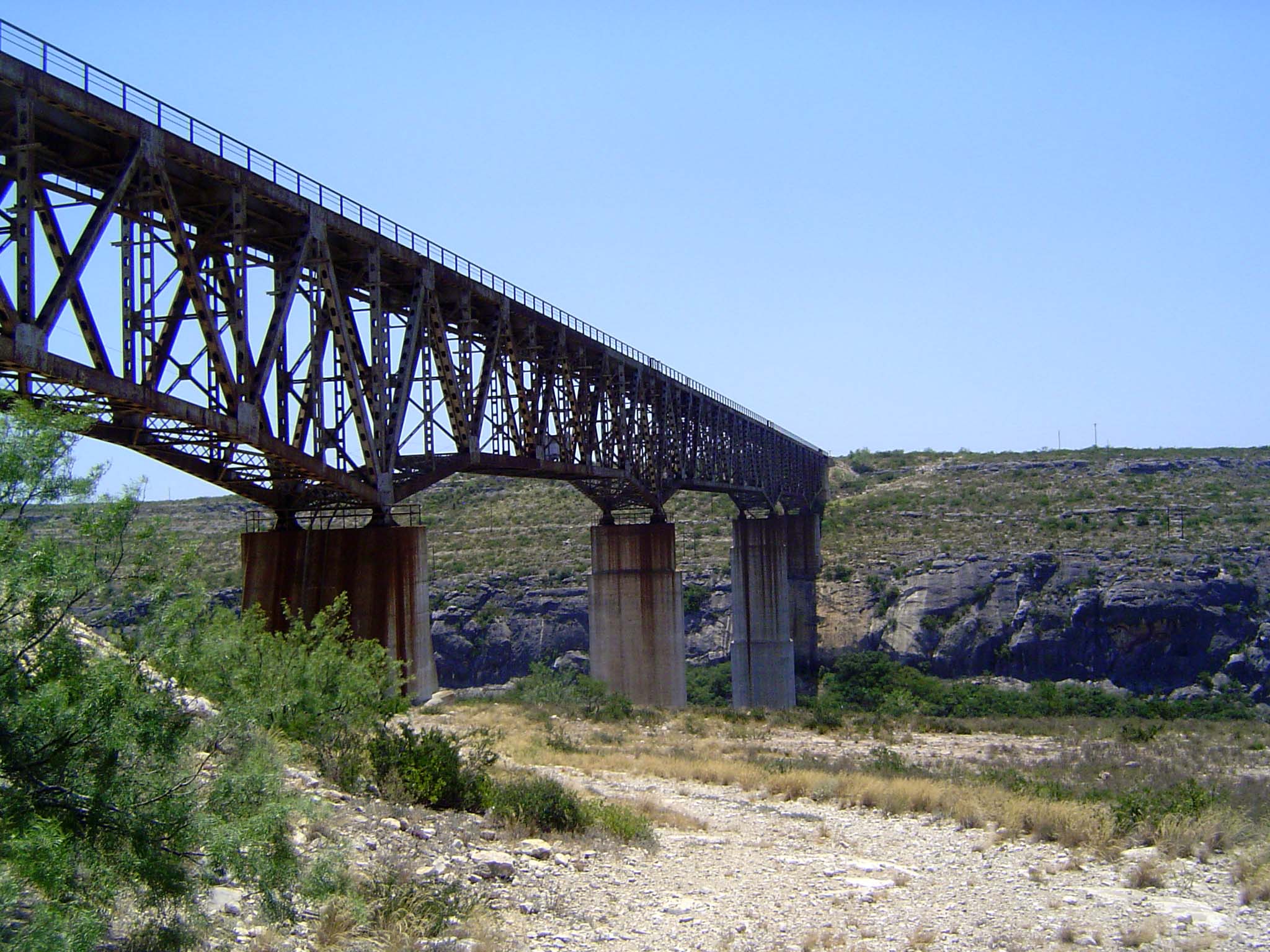Here's that railroad bridge, and quite a disappointment it is. The bridge was built during World war II. Steel was short but the bridge was