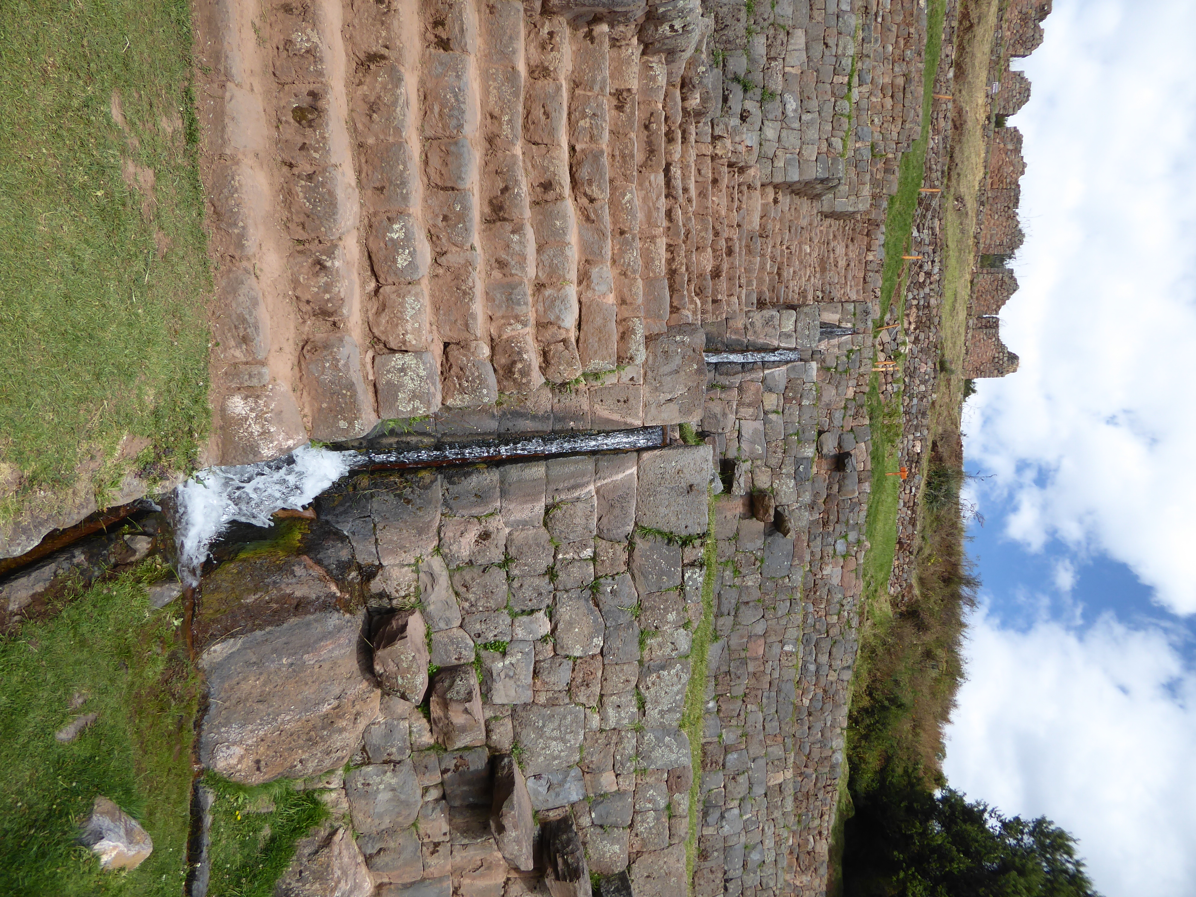 Water descends in a triple drop collecting the flow from all three longitudinal canals and bringing them to the largest of the terraces.