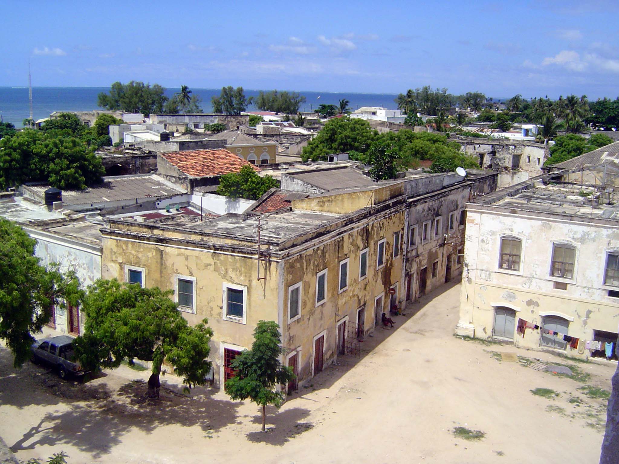 While we're here, we can look southeasterly over the stone town, mostly of coral or limestone blocks. Over the centuries, the island's econo