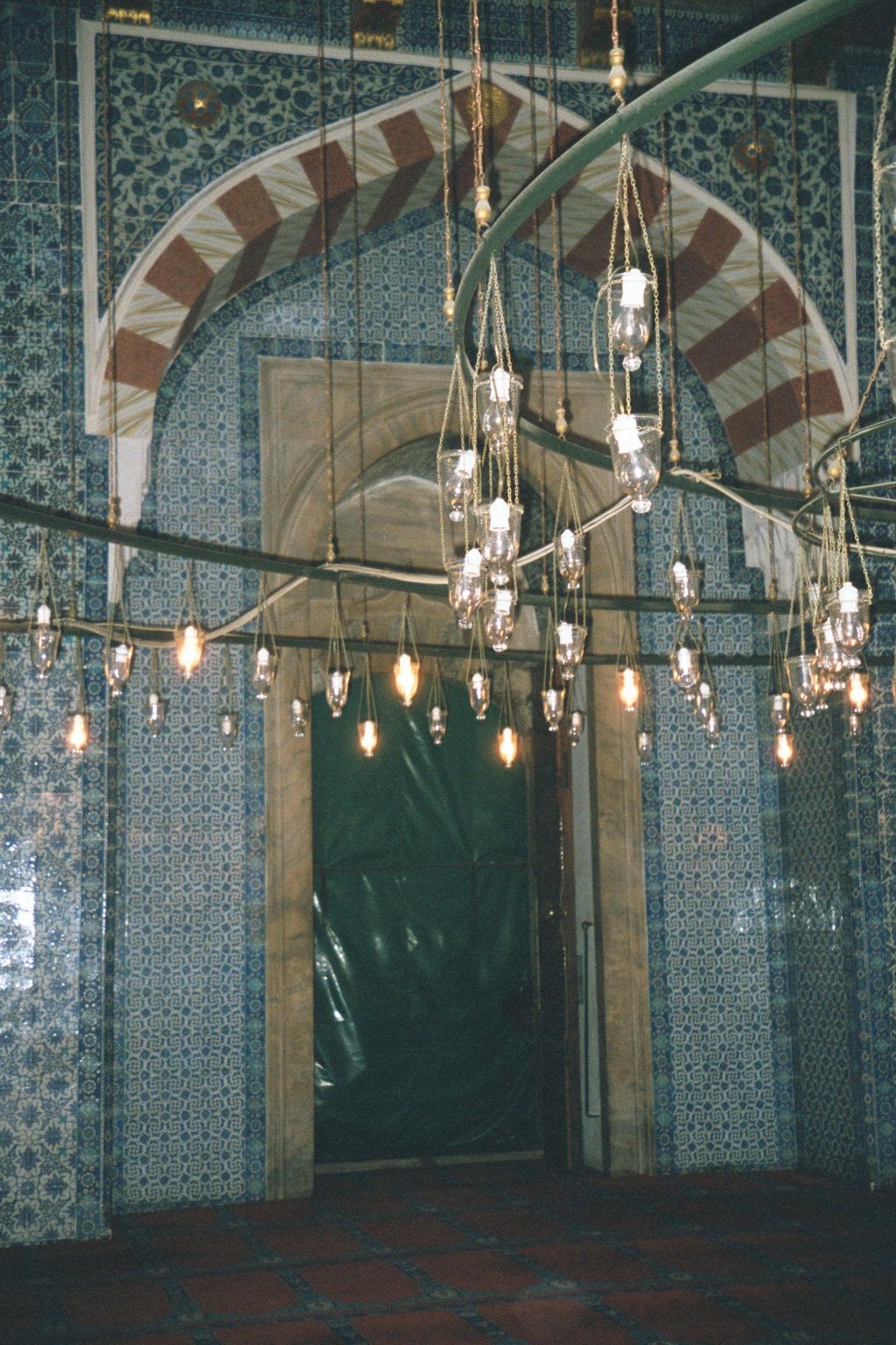 The blue tile came from Iznik, a town specializing in its production. The tile blankets the east wall of the mosque.