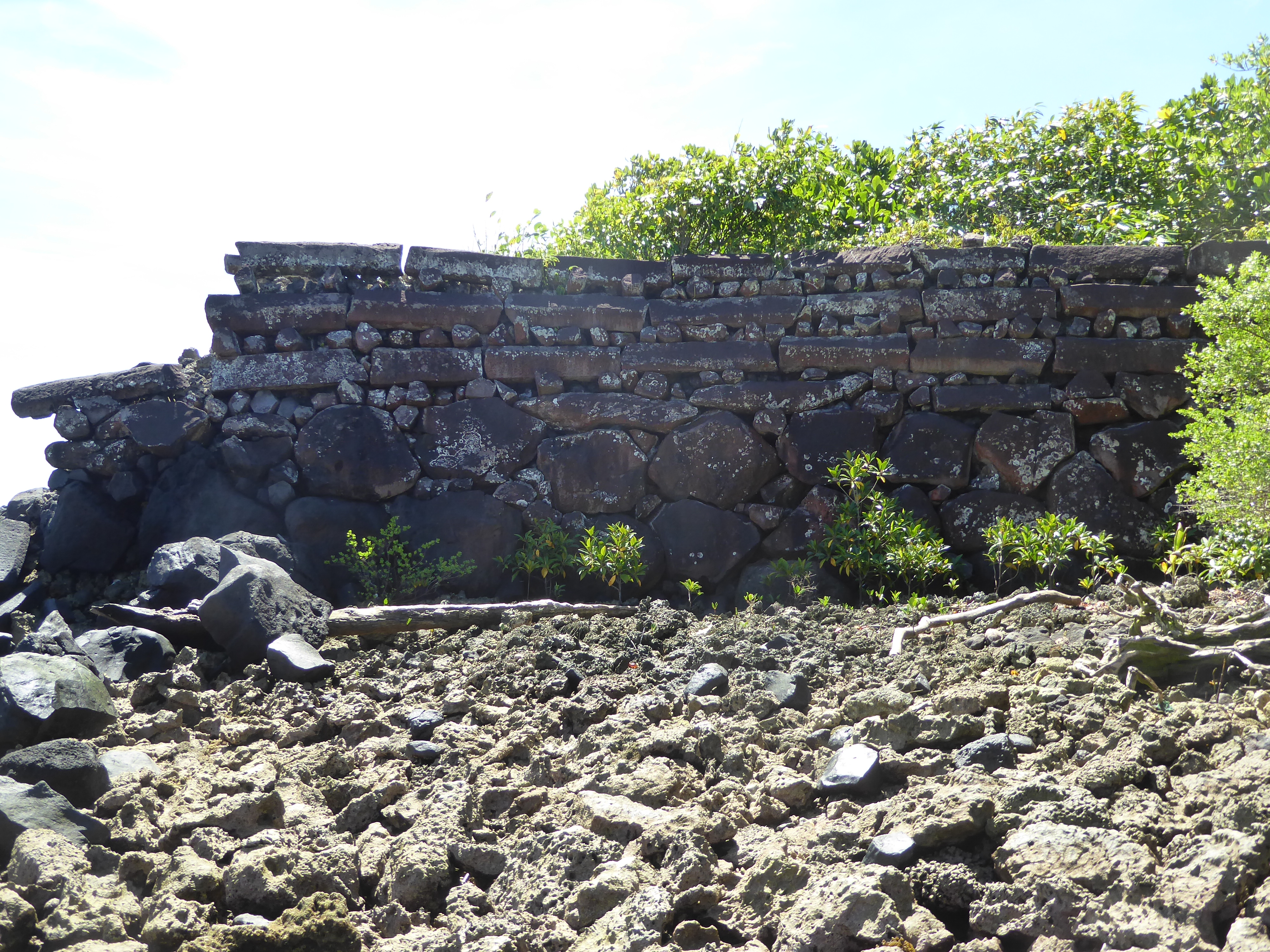 Here's the enclosure wall on Kerien; the base boulders are honest-to-God megaliths, but the coral jumble is a real hazard, unstable and wick