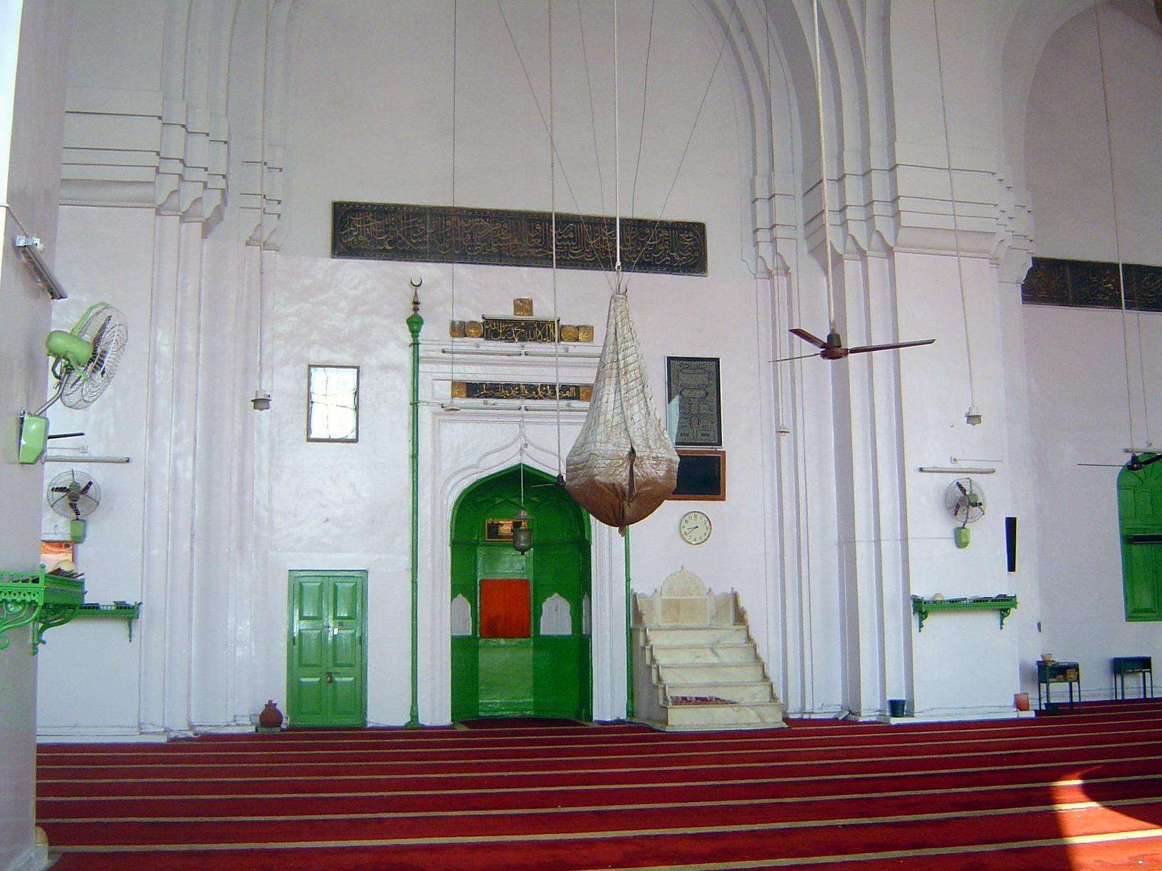 The west wall contains the mihrab, or prayer niche. The color scheme? Well, you just have to live with it.