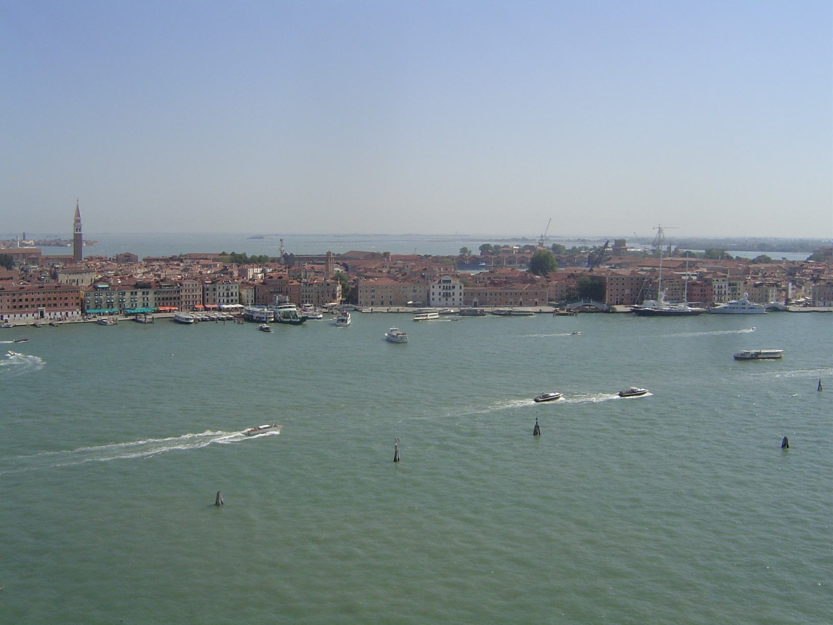 San Lorenzo is on the left now. On the right, the mouth of the Rio dell Arsenale can be seen; this is one of two entrances into the great sh