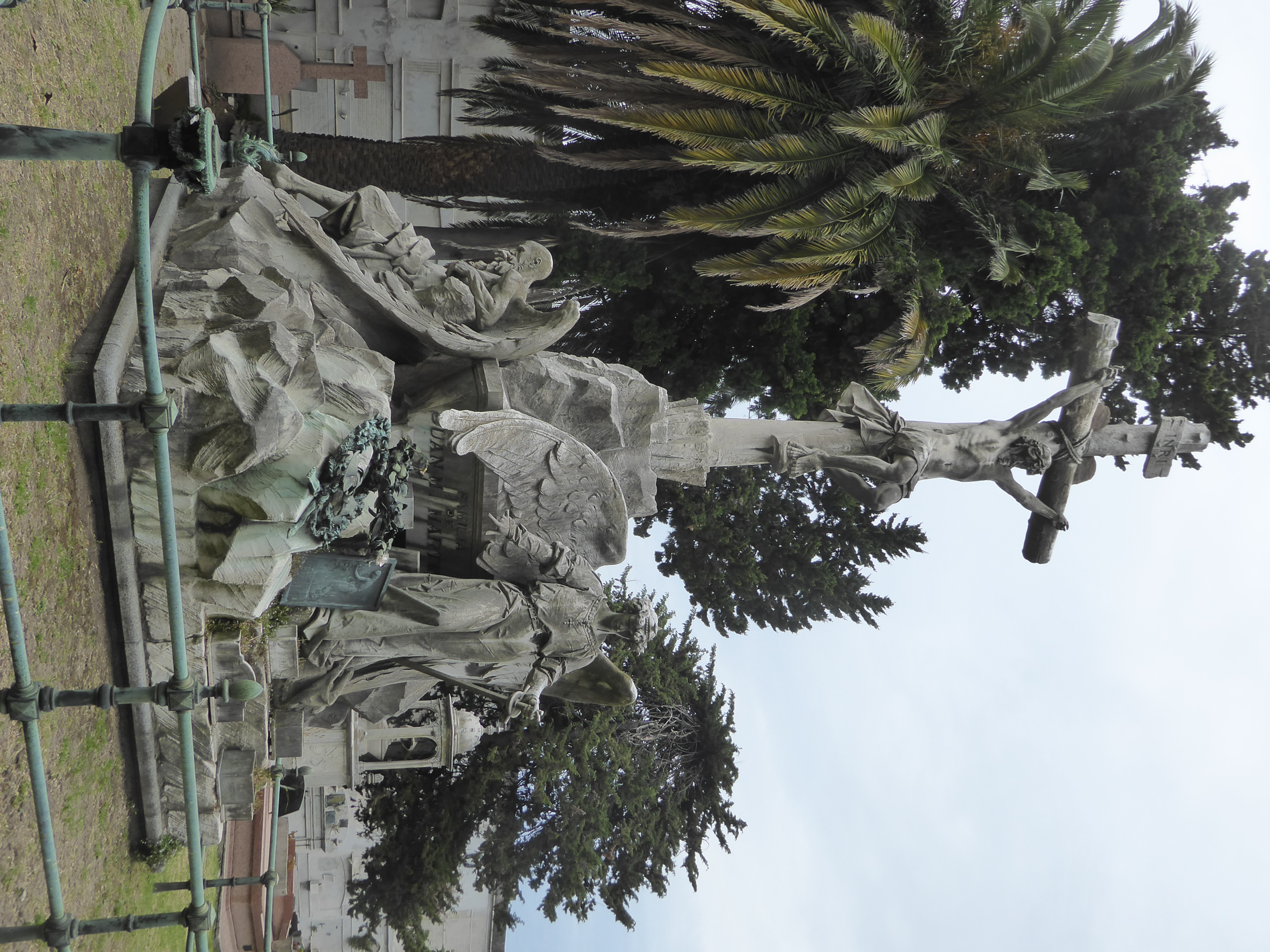 Here's a monument with the unusual sight of a geriatric angel, his wings still in good shape.