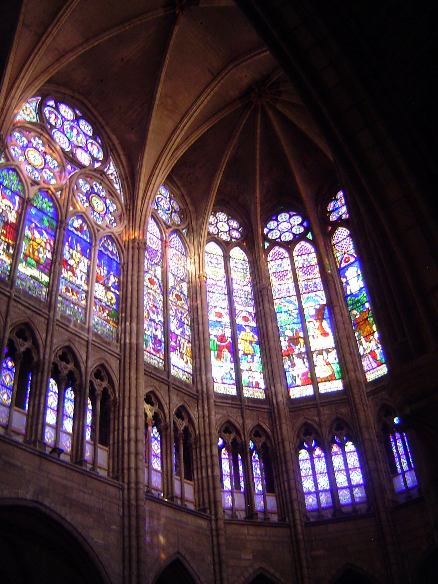 Most of the glass is modern, and the heavy piers were added in the 13th century. Still, the ambition is clear: to create a symbol of God as