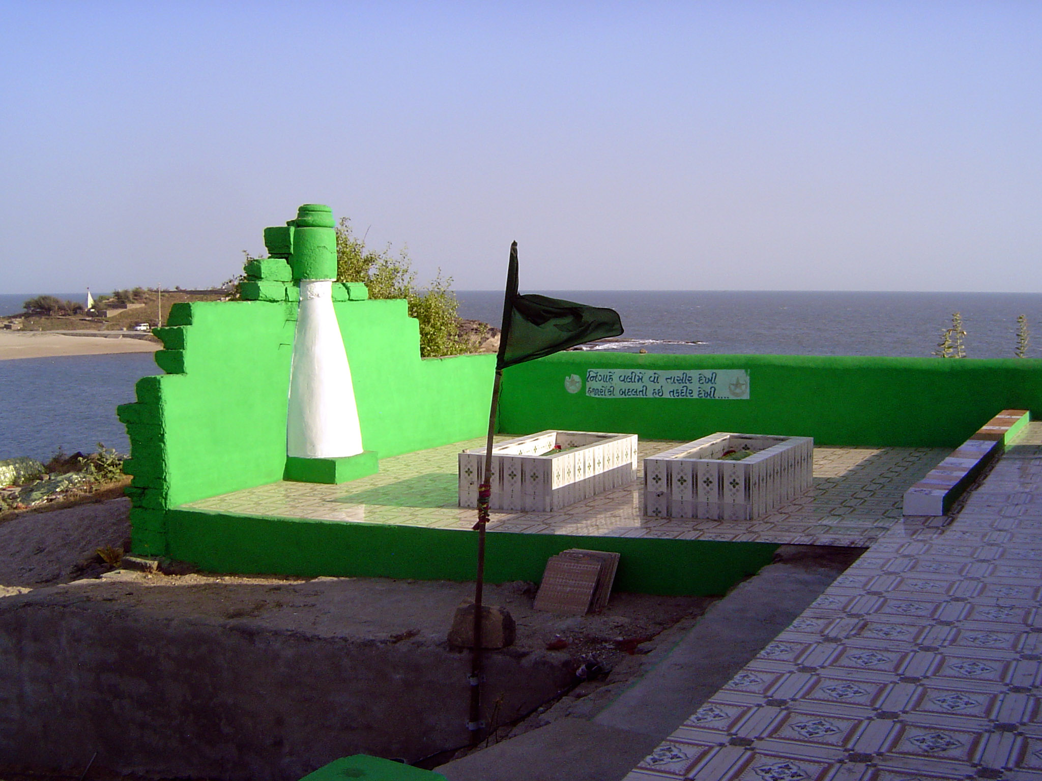 The mosque and tombs are new, of course, and the paint couldn't be newer. But the burials themselves are old and what is that curiously tape