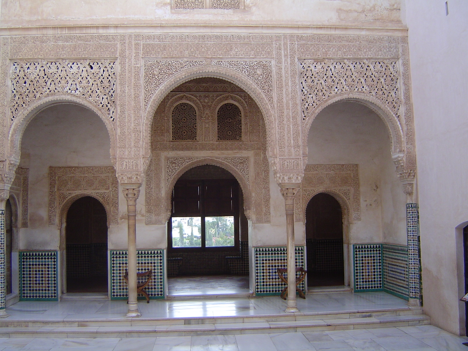 The north side of the same courtyard; the crude tile we saw earlier is in the passage entering on the left: beyond the doorway is the golden