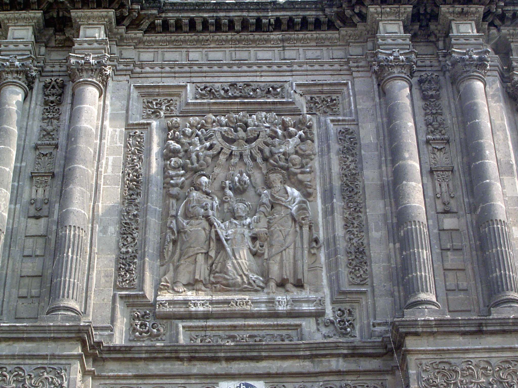 St. Dominic receives both the keys of heaven from Saint Peter and the Epistles from Saint Paul. Above them, a dove represents the Holy Spiri