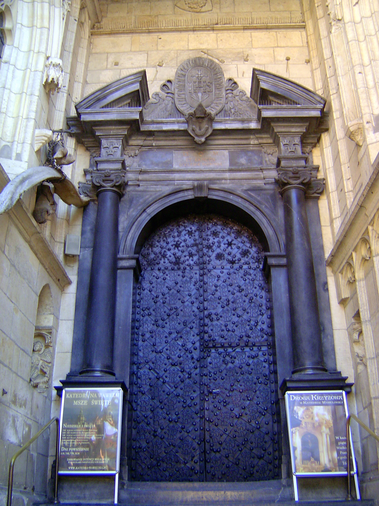 The doors to the cathedral carry the letter K in a font treacherously easy to misread as a B. That would be K for Kazimierz Casimir III, who