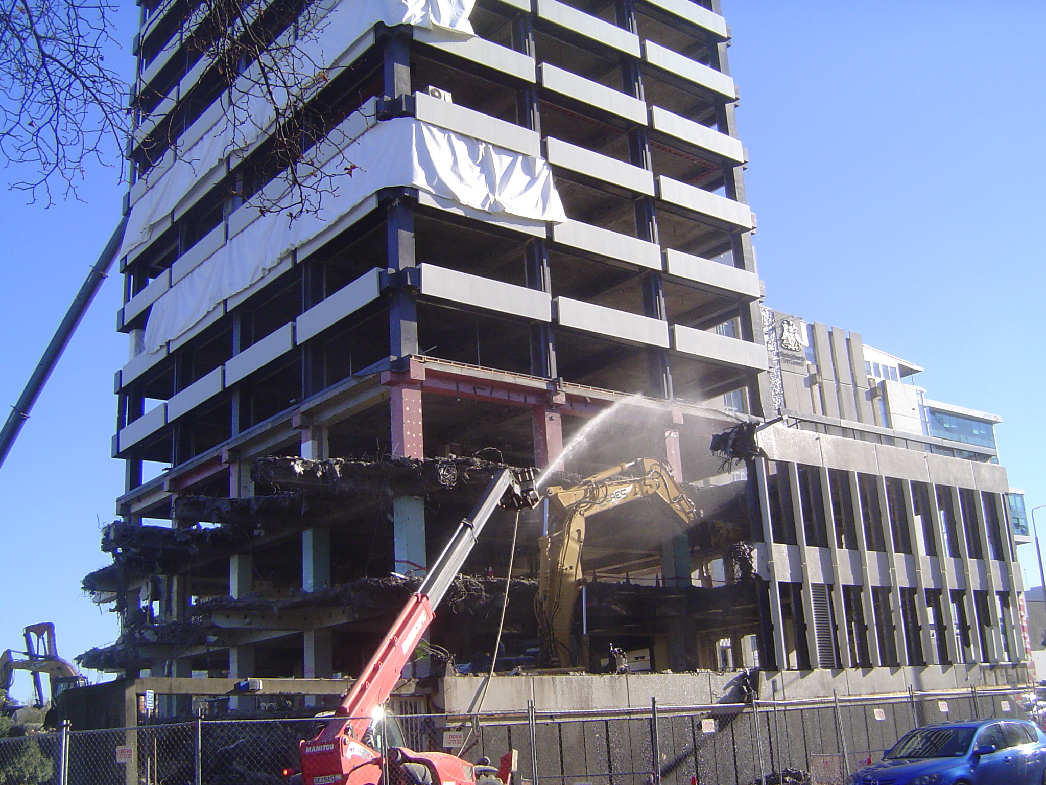 A few days after this photo was taken, the building was imploded. Meantime, water kept the dust down while a "nibbler" did its work.