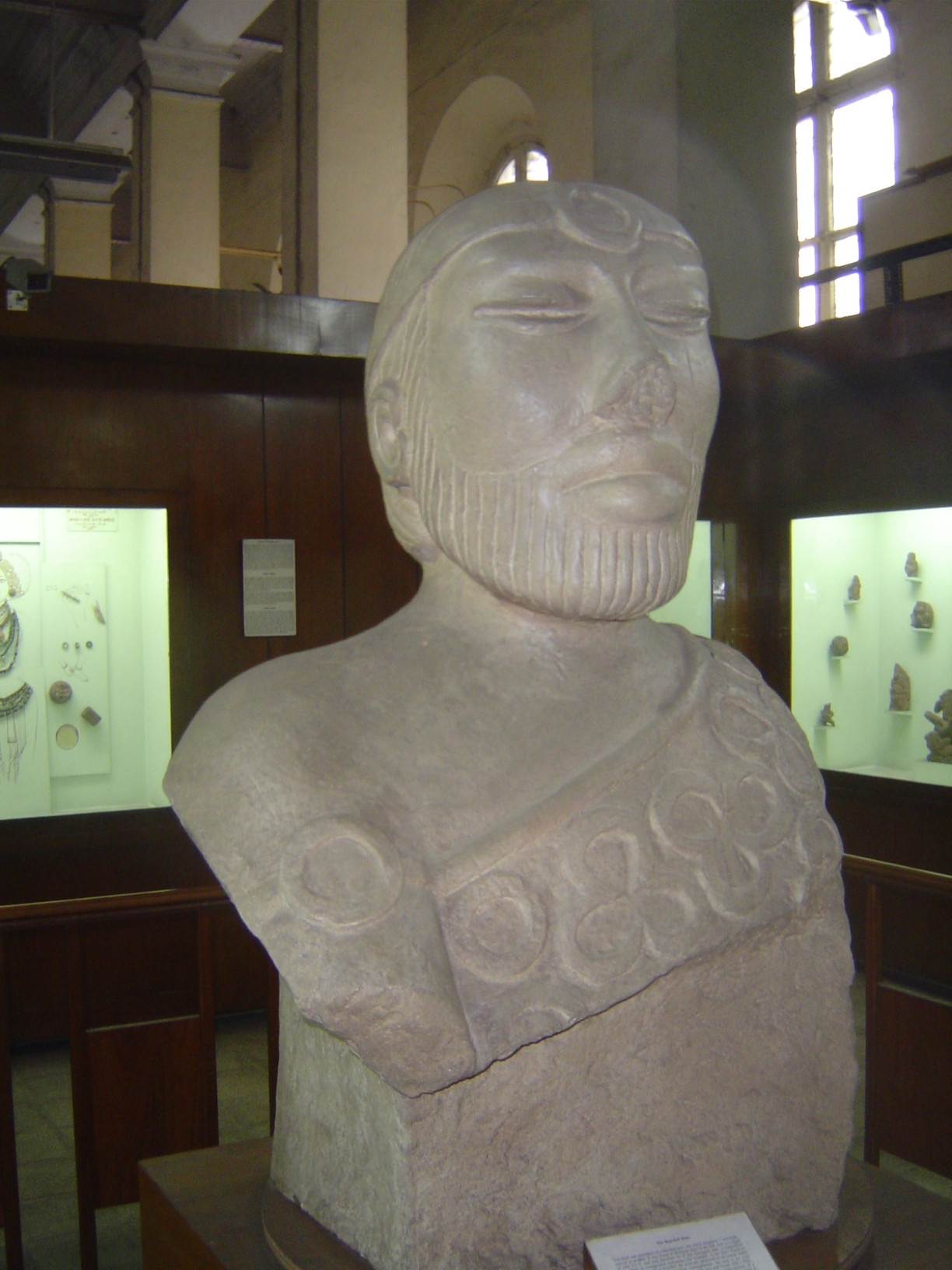 Off to one side, a room with this remarkable bust taken from Mohenjo-Daro, a city of the Indus Civilization, which collapsed before 2,000 B.