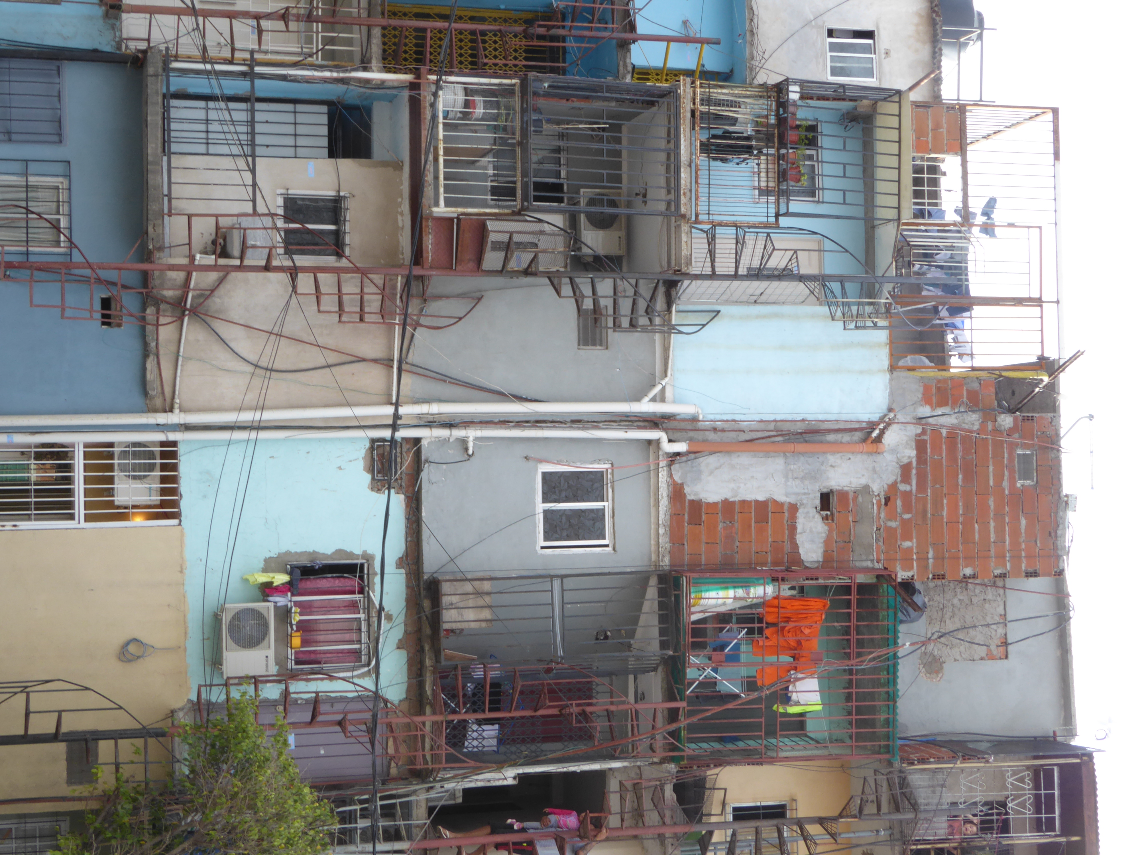 This one reaches extraordinary heights, with the space-saving device of external, spiral stairs.