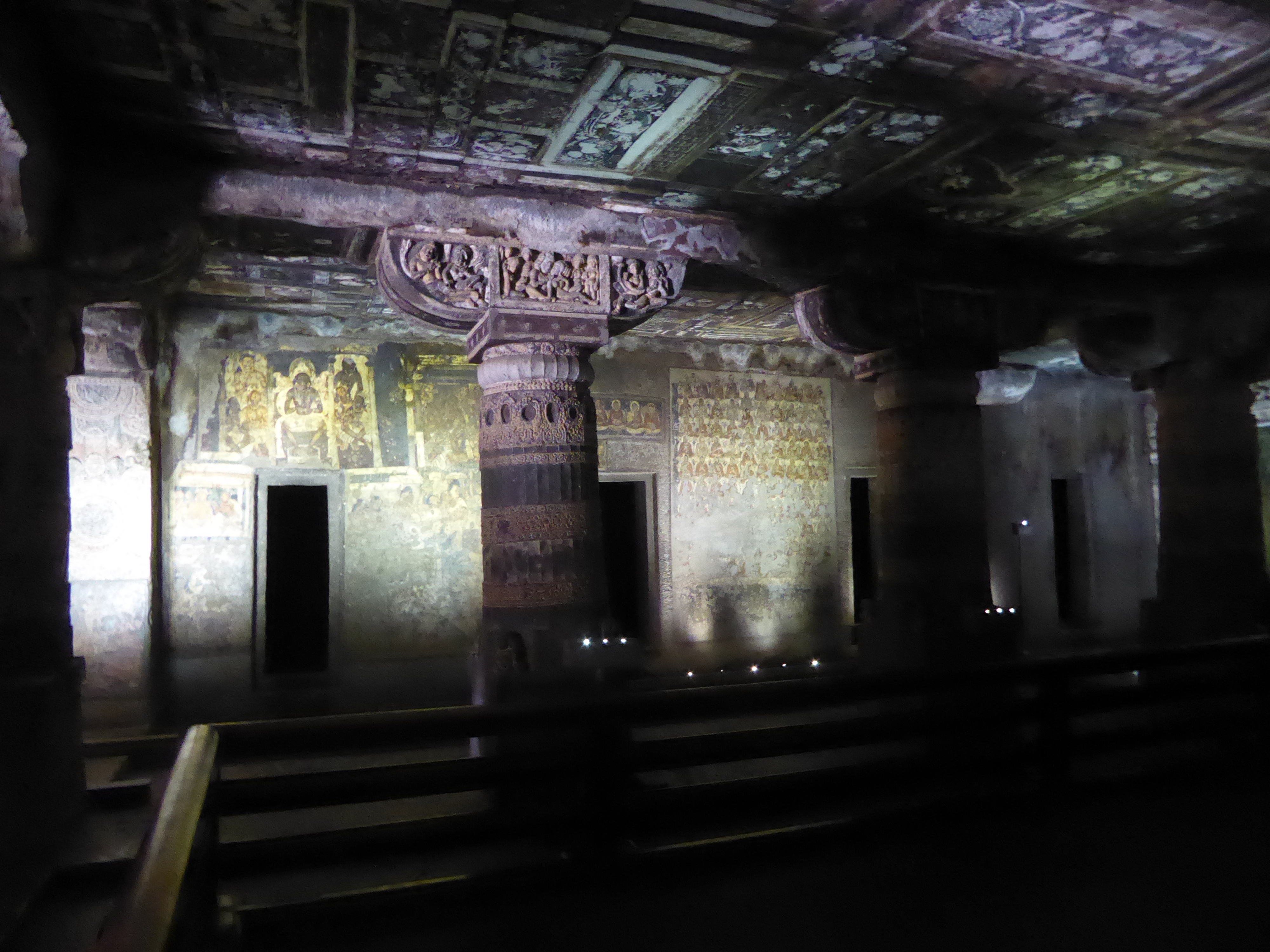 More dalliances on Cave 2's column capitals? The wall painting on the left shows the Buddha in the Tushita Heaven; the one on the right, the