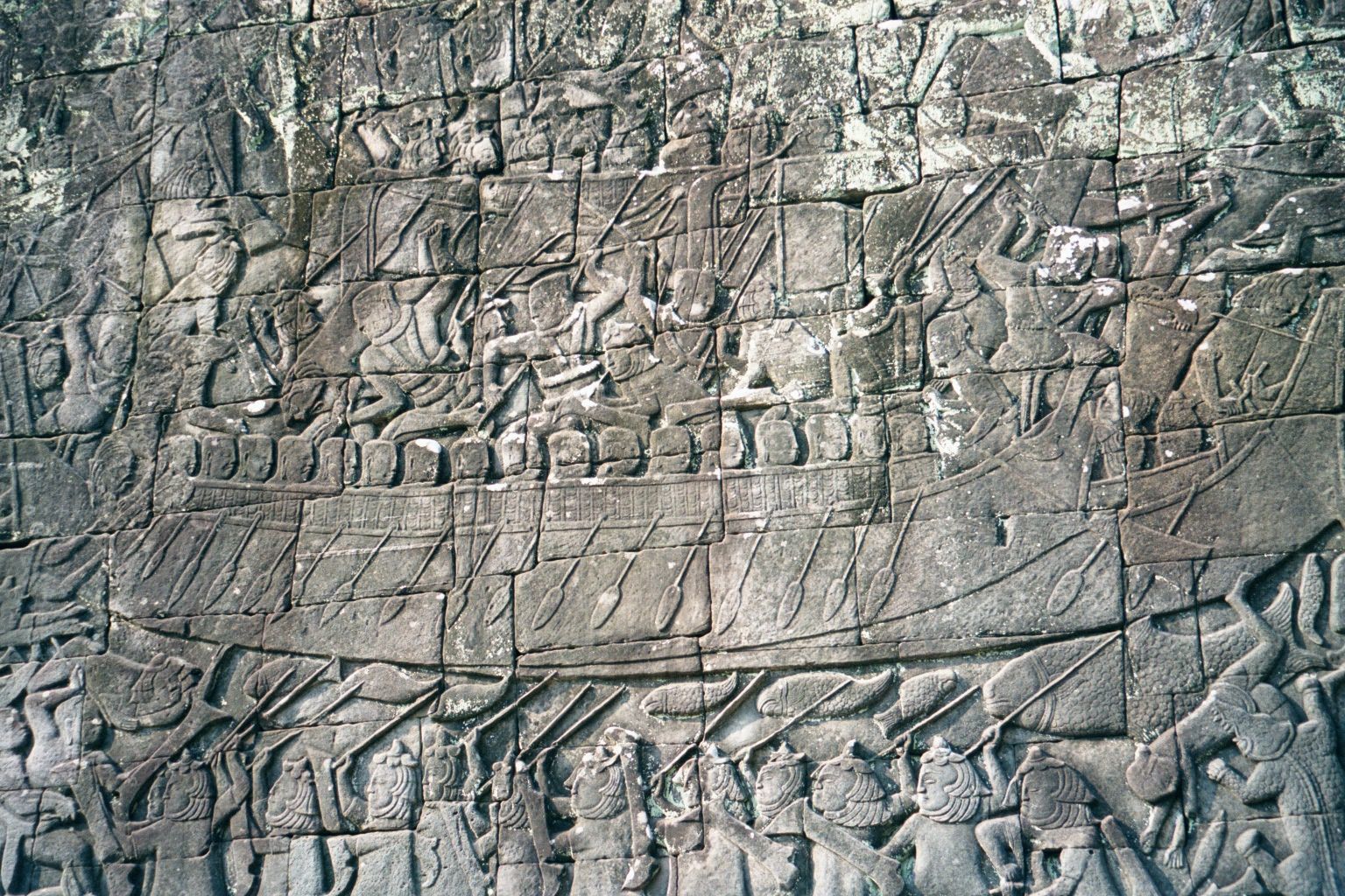 Lest this reading of Bayon and the gates of Angkor Thom seem too political, here is a carved panel from the lower deck of the Bayon: the scu