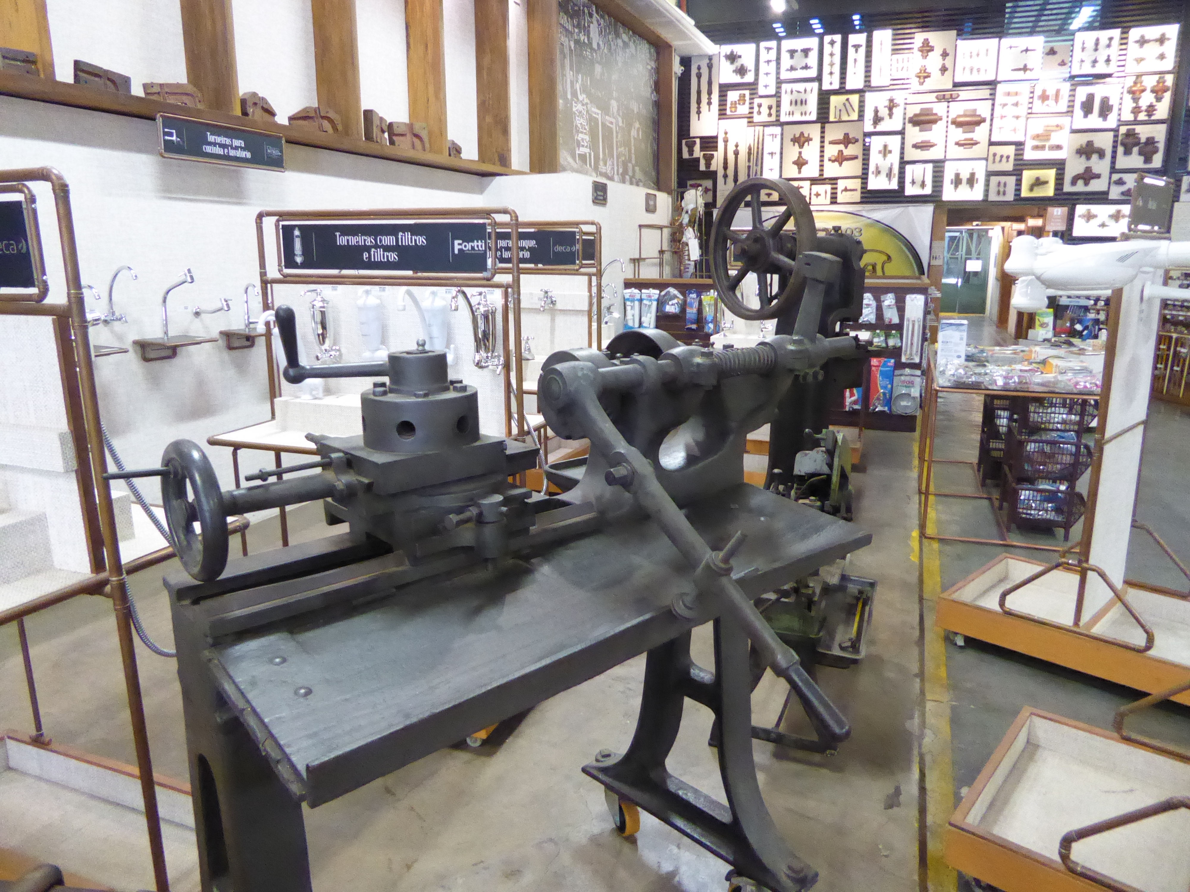 The shop still sells plumbing fixtures but sets aside some floor space as a museum of plumbing technology.