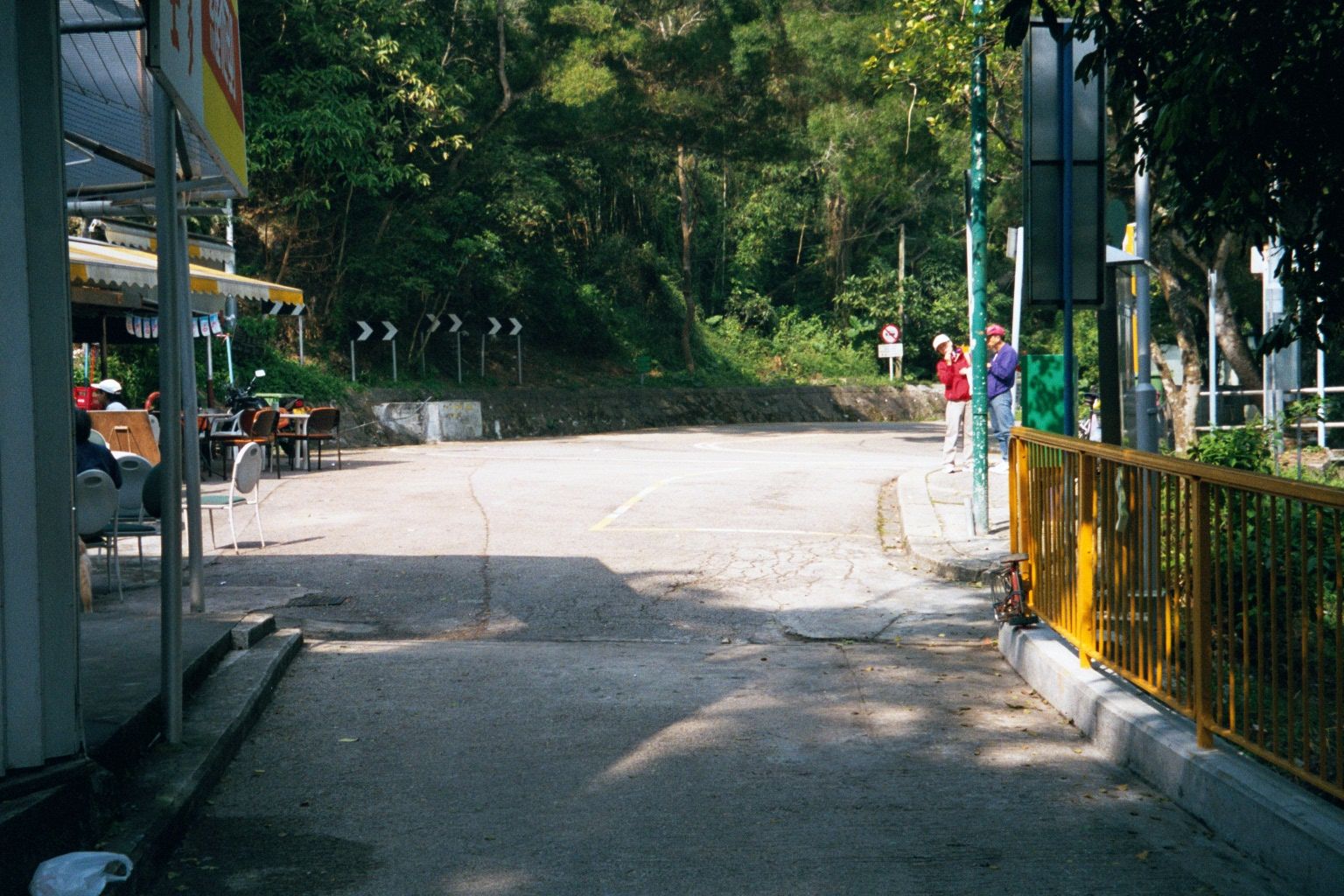 Where's everyone gone? Well, this is back at the entrance to the village, which lies behind the camera. Buses come here and feed right back
