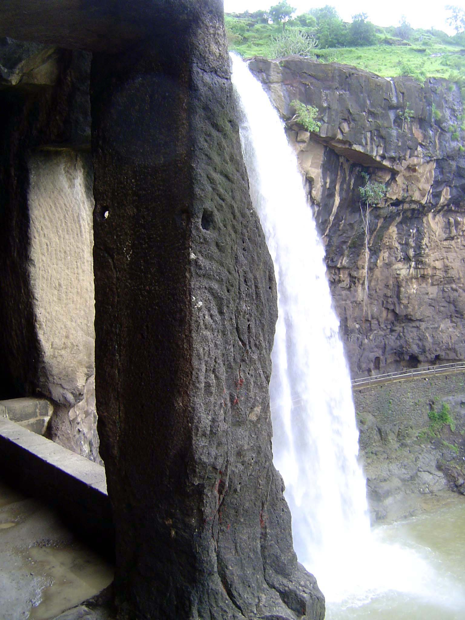 One of those caves opens next to the fall.