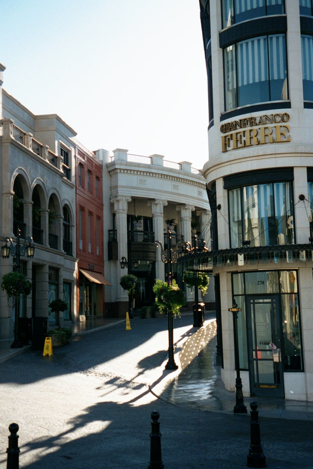 Shopping Becomes the City: Tiffany, Porsche, Versace, Bulgari, etc., all at the corner of Rodeo Drive and Wilshire. The private street is "V