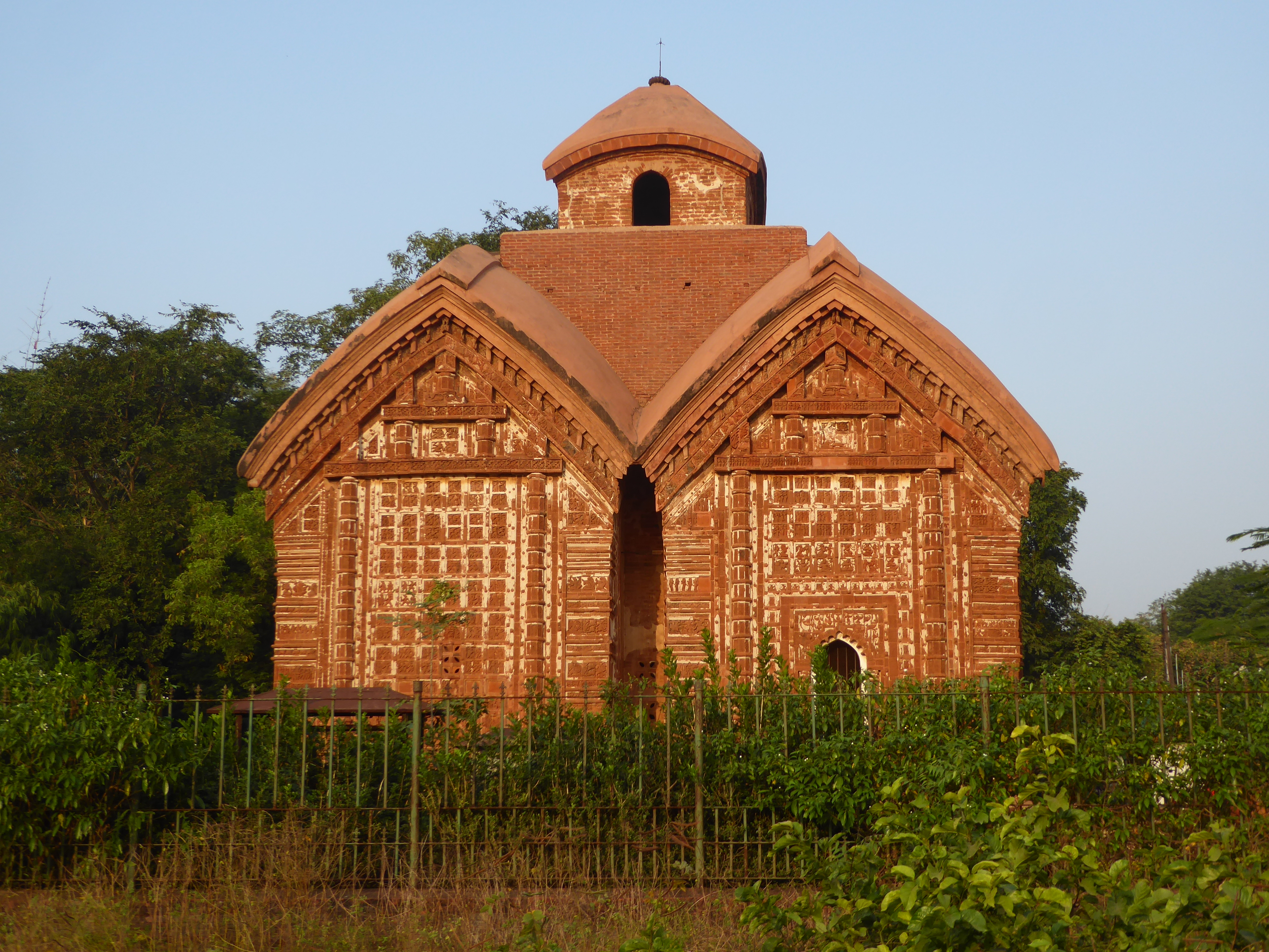 In 1655, only a dozen years after Raghunath's Syama Raya temple, the same king built the Jor Bangla or "Twin Bangla Huts" Temple. The temple
