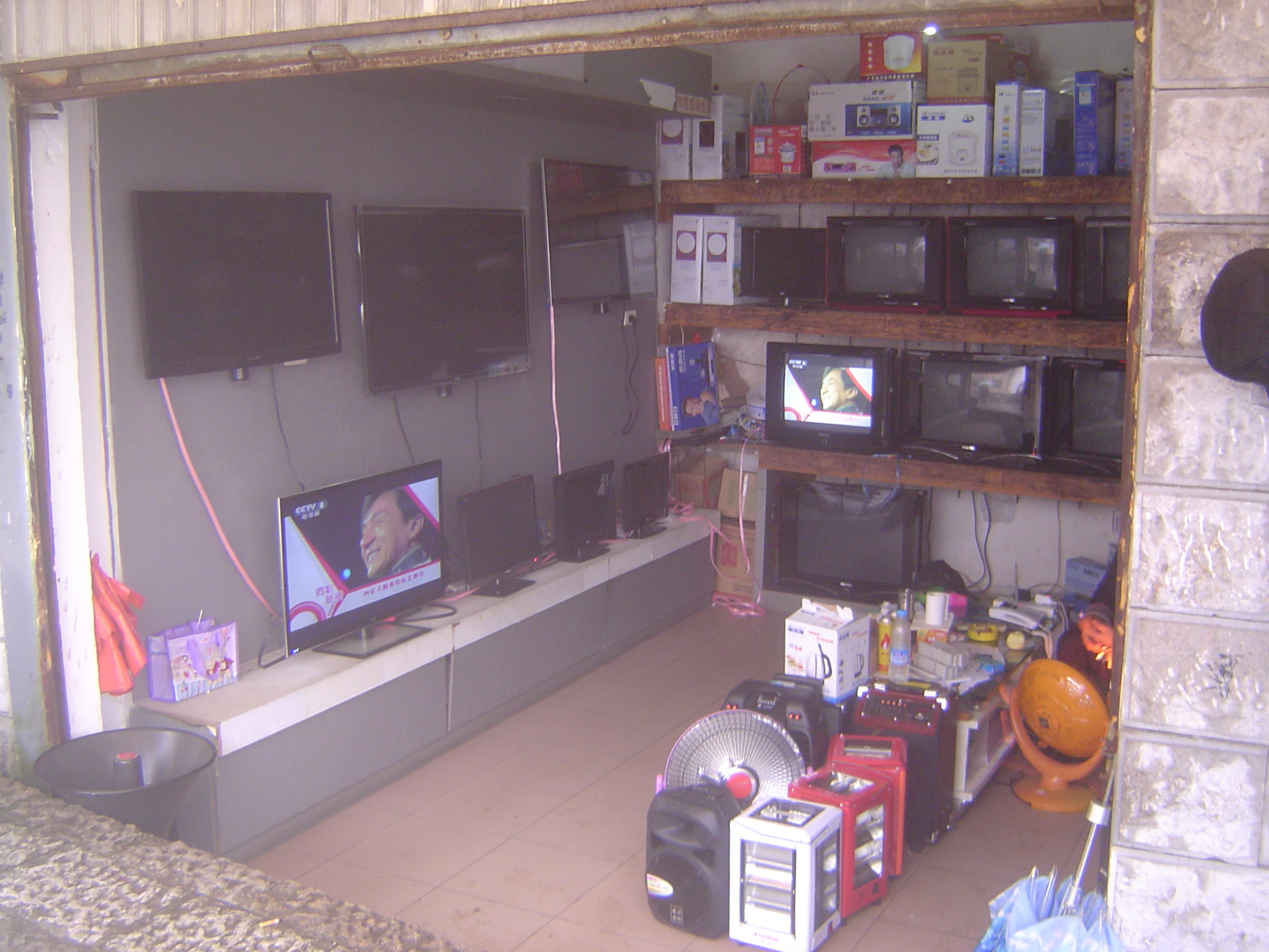 You wonder where people in the villages buy their TVs? Wonder no more. The radiant heaters help in the damp winters but are expensive to run