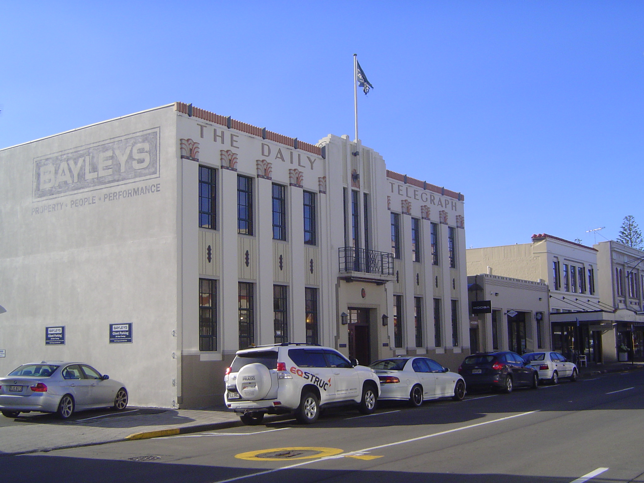 The old newspaper office, destroyed in the quake, was rebuilt in 1933. It now houses a realty office.