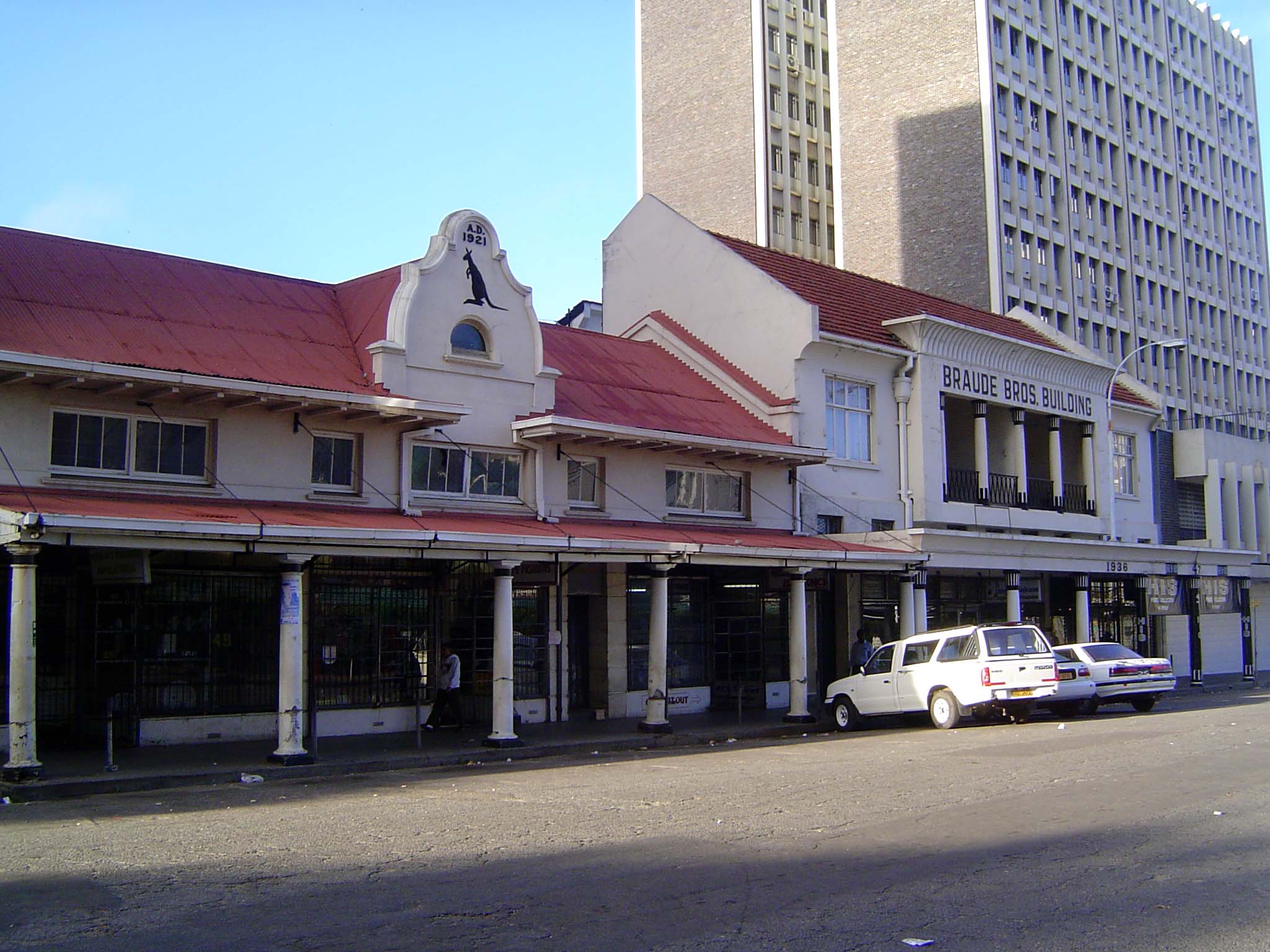 The territorial-style ironwork of the commercial district eventually fell from fashion. The gable kangaroo is a puzzle.