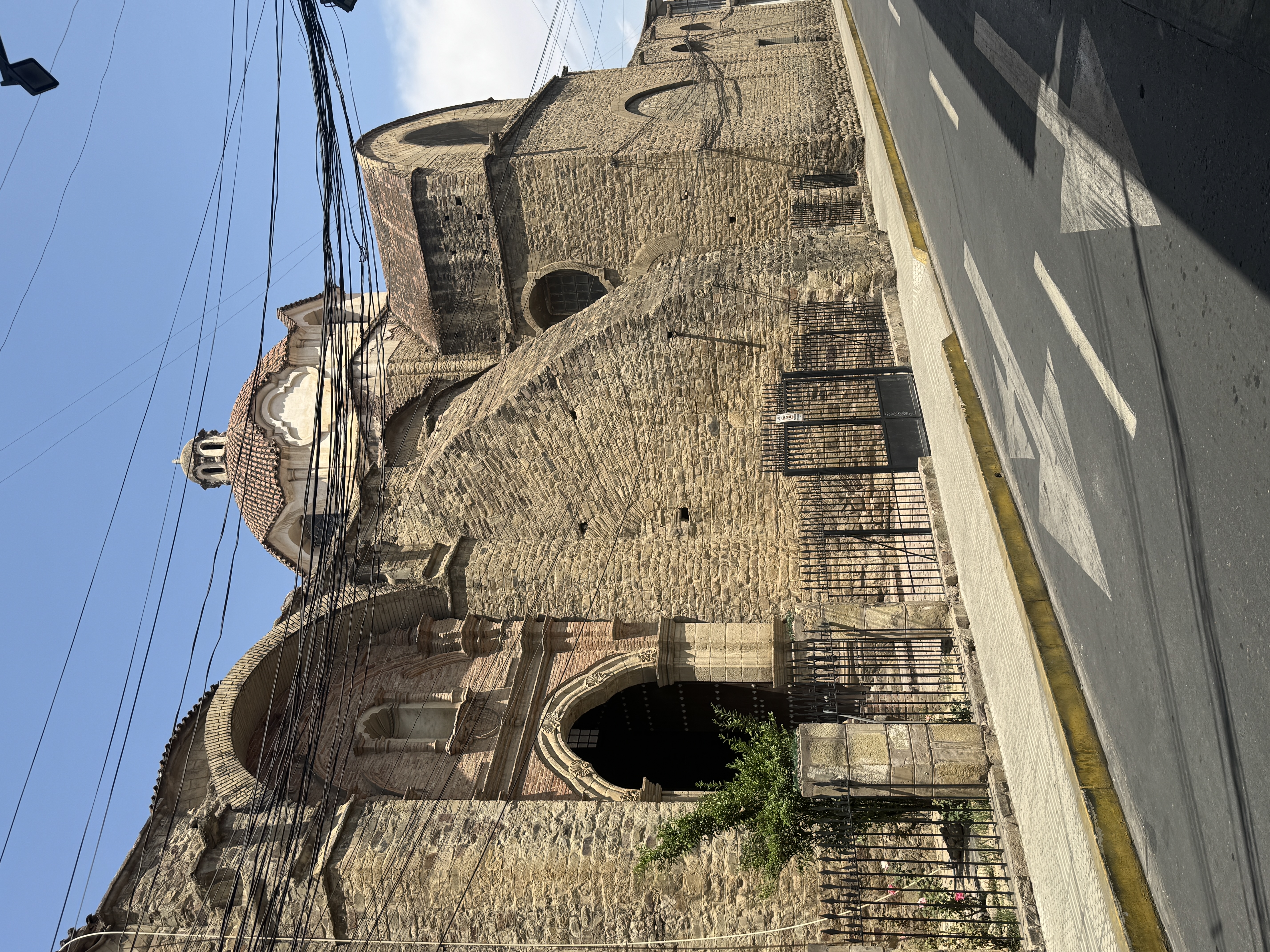 Around the side there's some crude buttressing, but notice that door.