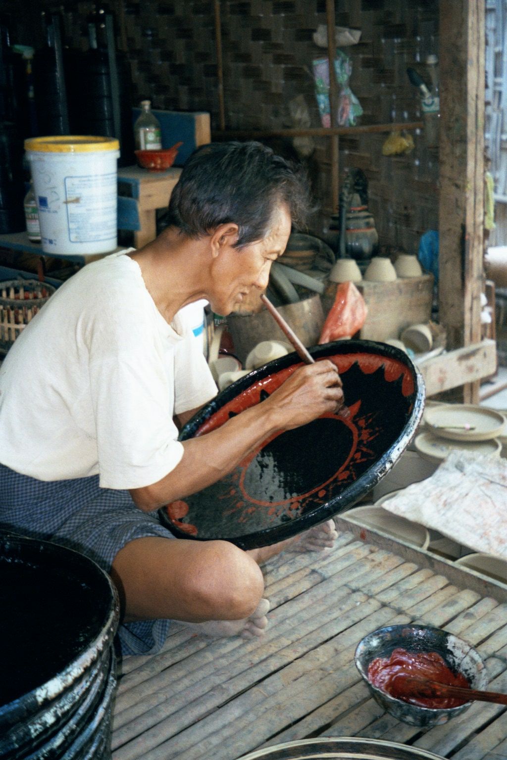 Craft production for tourists is important: here, lacquerware is prepared at Myinkaba Village, south of the old city.
