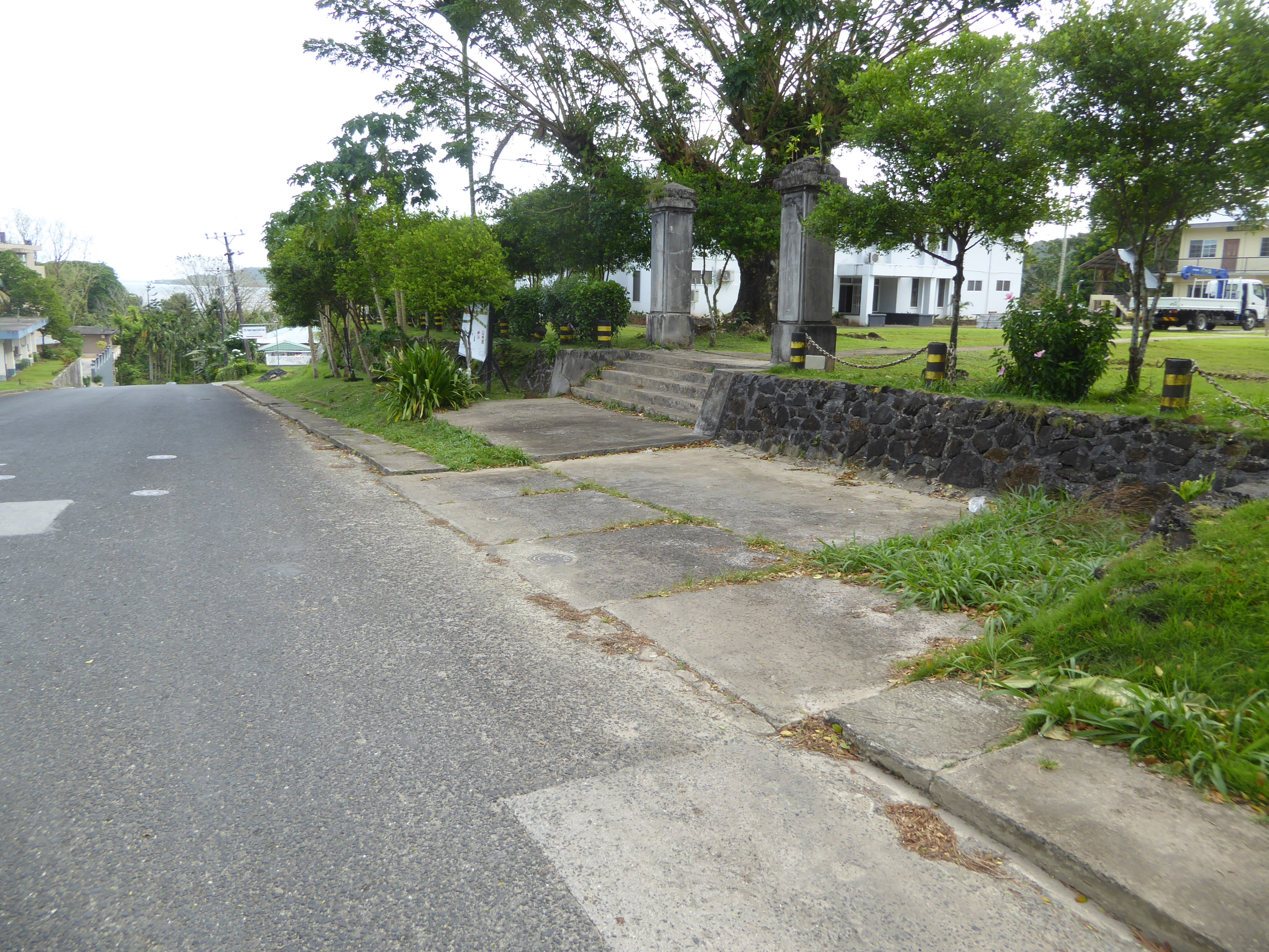 On an intermediate street, the Japanese built a school. Here's the entrance, with the school behind. The building is used today as the Kolon
