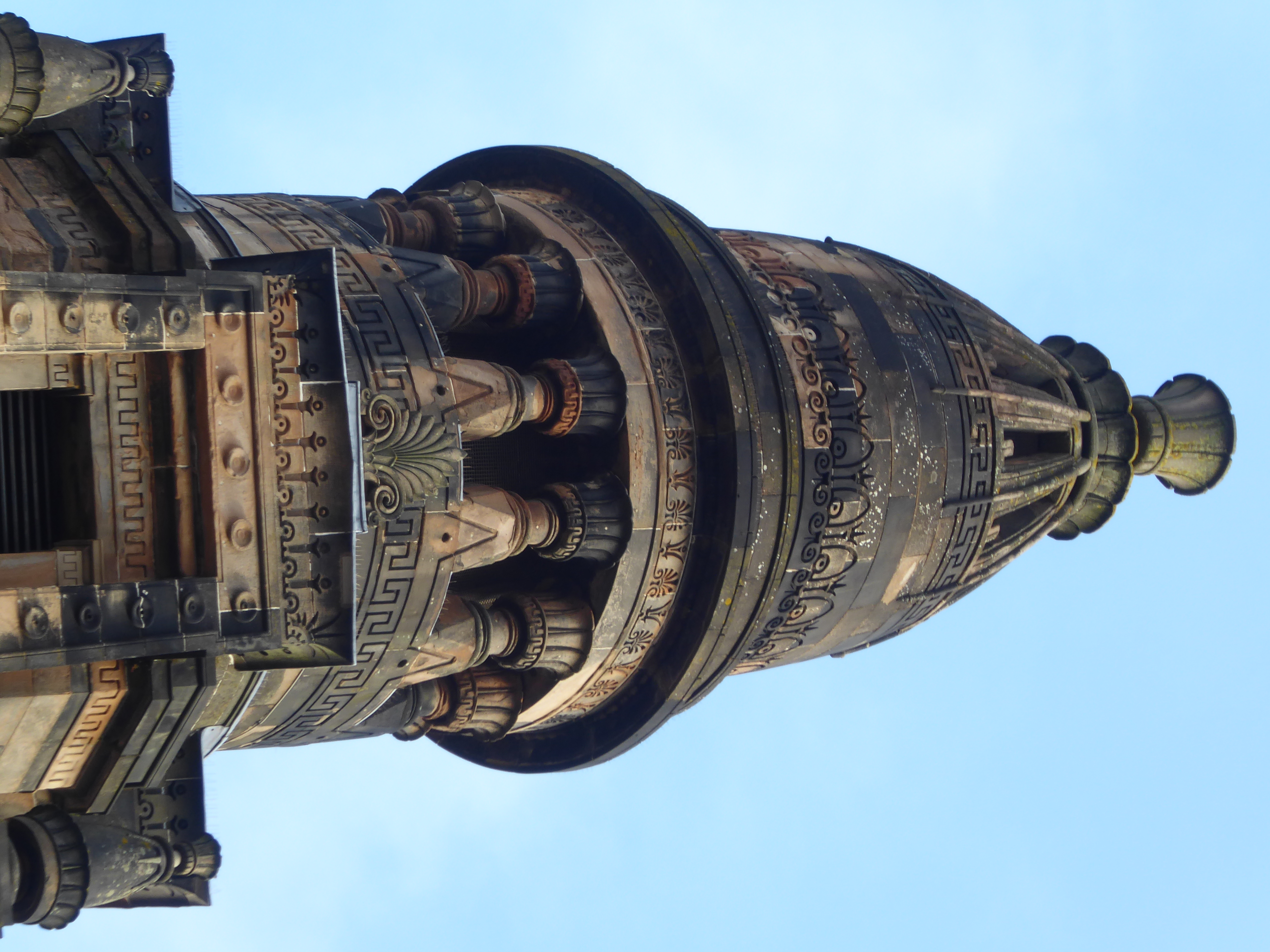 The tower makes me wonder why Thomson ever got the nickname "Greek." See the line of railway cars trundling along?