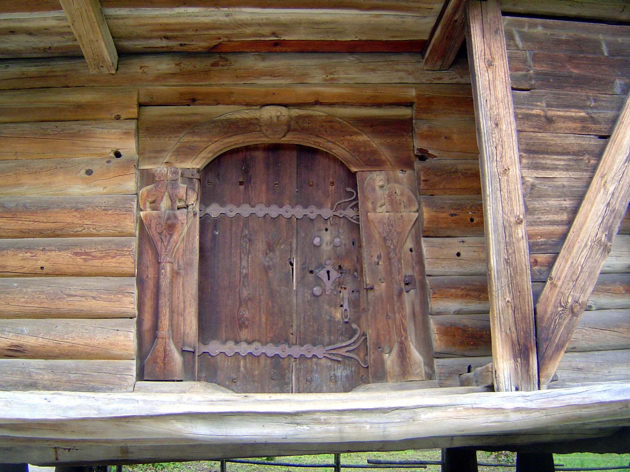 The doorway, massive yet tender.