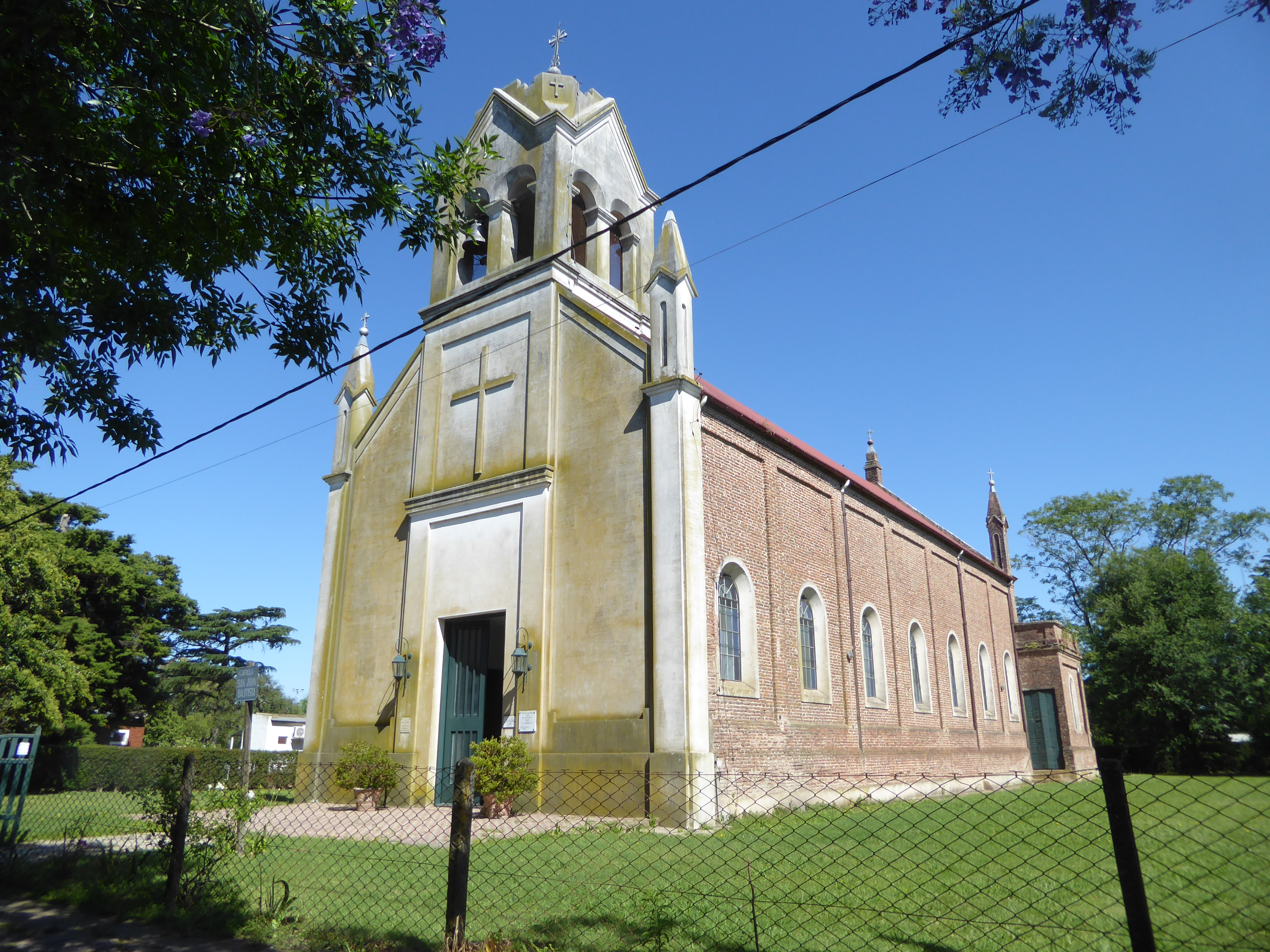A Catholic church is the most impressive building in town.