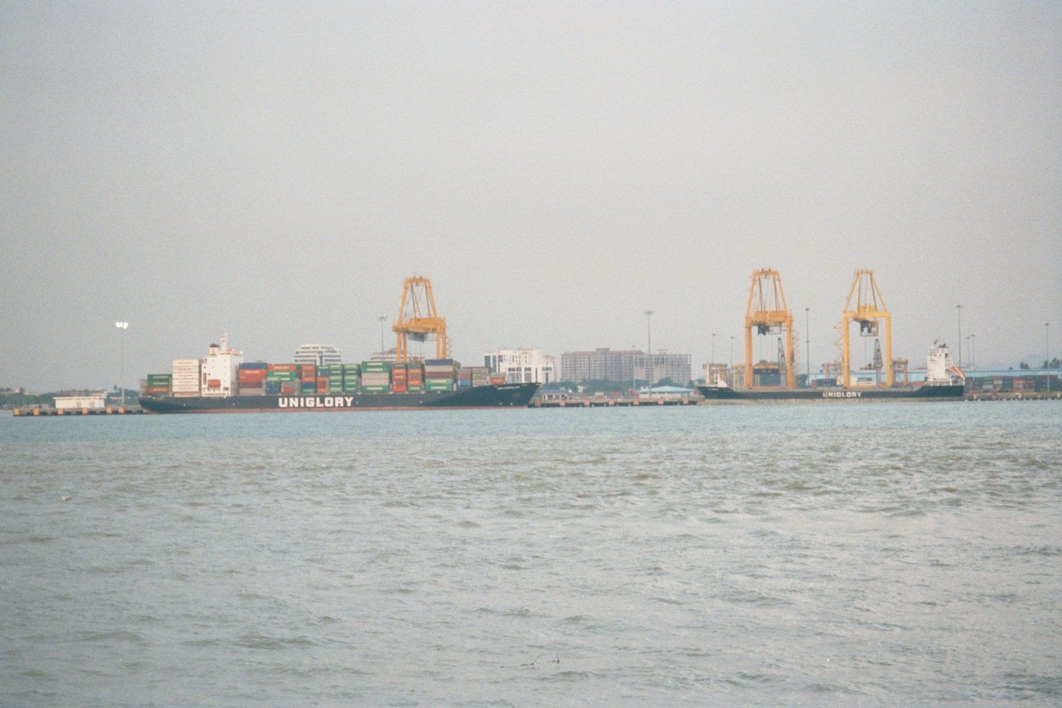 The same transformation is evident along the waterfront. Here: a zoomed shot across to the container port on the mainland.