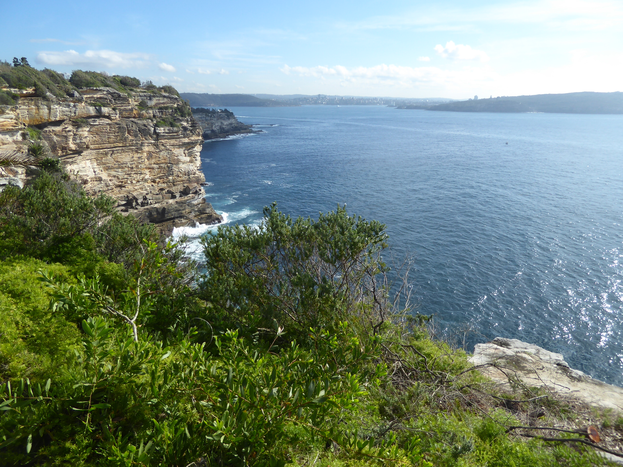 It's a narrow peninsula with cliffs on both sides and, on the inside side, a view of the distant city. How many big cities enjoy such a view